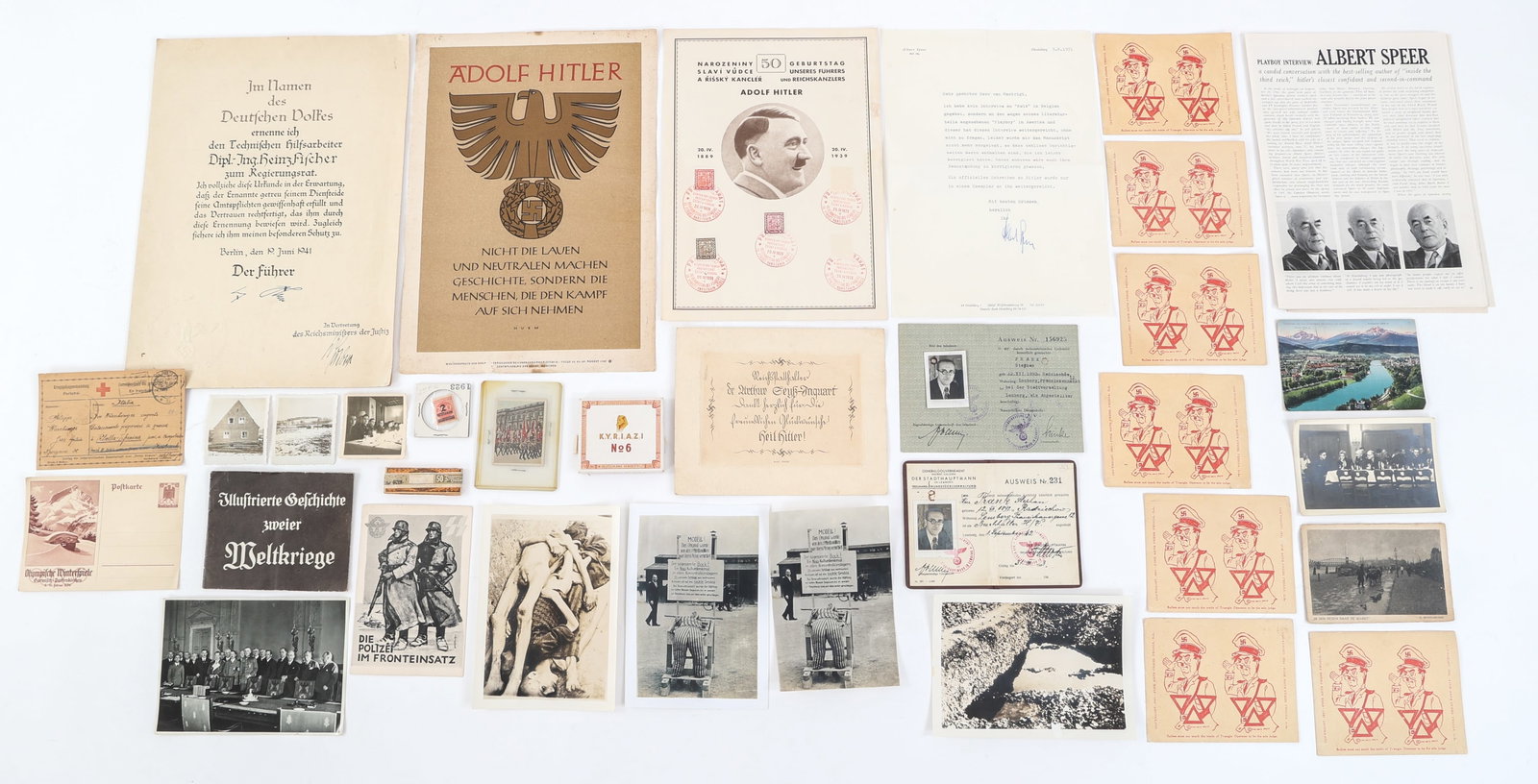 WWII GERMAN PROPAGANDA POSTCARDS, BOOKLETS, MORE: WWII GERMAN PROPAGANDA POSTCARDS, BOOKLETS, MORE WWII German Propaganda Items. Lot includes photographs and postcards, booklets, stamps, and cigarette case.