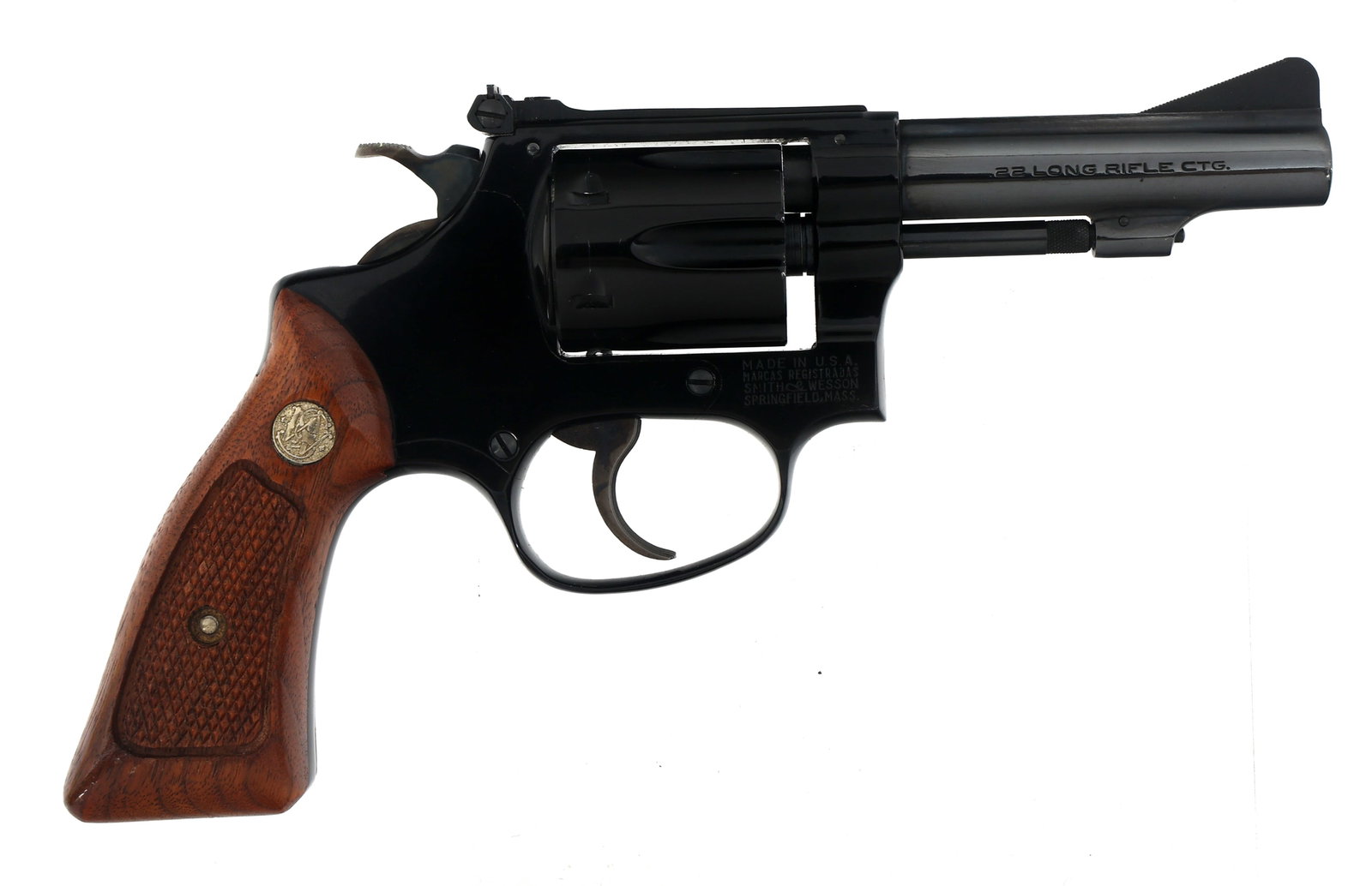 SMITH & WESSON MODEL 43 .22 LR CALIBER REVOLVER: SMITH & WESSON MODEL 43 .22 LR CALIBER REVOLVER Smith & Wesson Model 43 .22 LR caliber double action revolver. Blued finish. Checkered wood grips with S&W medallion. Adjustable rear sight. Six shot fl