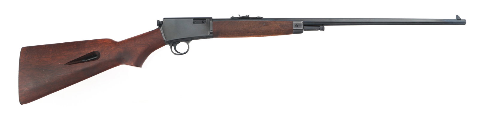 TAURUS MODEL 63 .22 LR CALIBER SEMI AUTO RIFLE: TAURUS MODEL 63 .22 LR CALIBER SEMI AUTO RIFLE Taurus Model 63 .22 LR caliber semi automatic rifle. Blued finish. Wood stocks. Adjustable rear sight. Taurus security system with two keys. Cardboard Ta