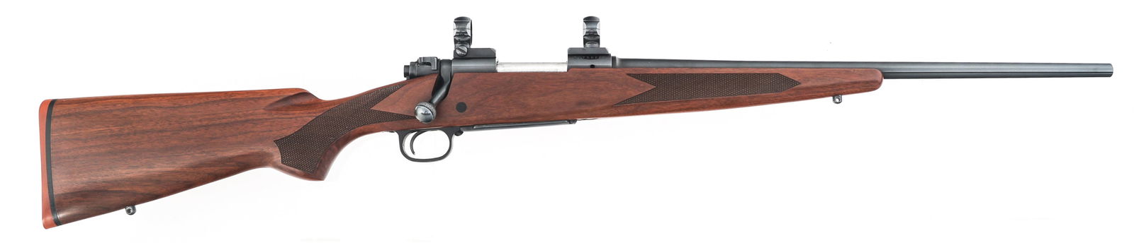 WINCHESTER MODEL 70 .243 WIN CALIBER RIFLE: WINCHESTER MODEL 70 .243 WIN CALIBER RIFLE Winchester Model 70 .243 Win caliber bolt action rifle. Blued finish. Scope rings. Jeweled bolt. Checkered wood stock. Rubber recoil pad. | Caliber / Gauge: