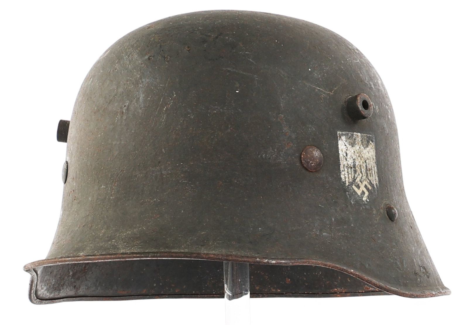 WWII GERMAN M16 AUSTRIAN TRANSITIONAL SD HELMET: WWII GERMAN M16 AUSTRIAN TRANSITIONAL SD HELMET WWII German Heer M16 Austrian Transitional Single Decal Helmet. Heer eagle decal below left vent hole. "64" stamped on the interior rim. 8-tongue leathe