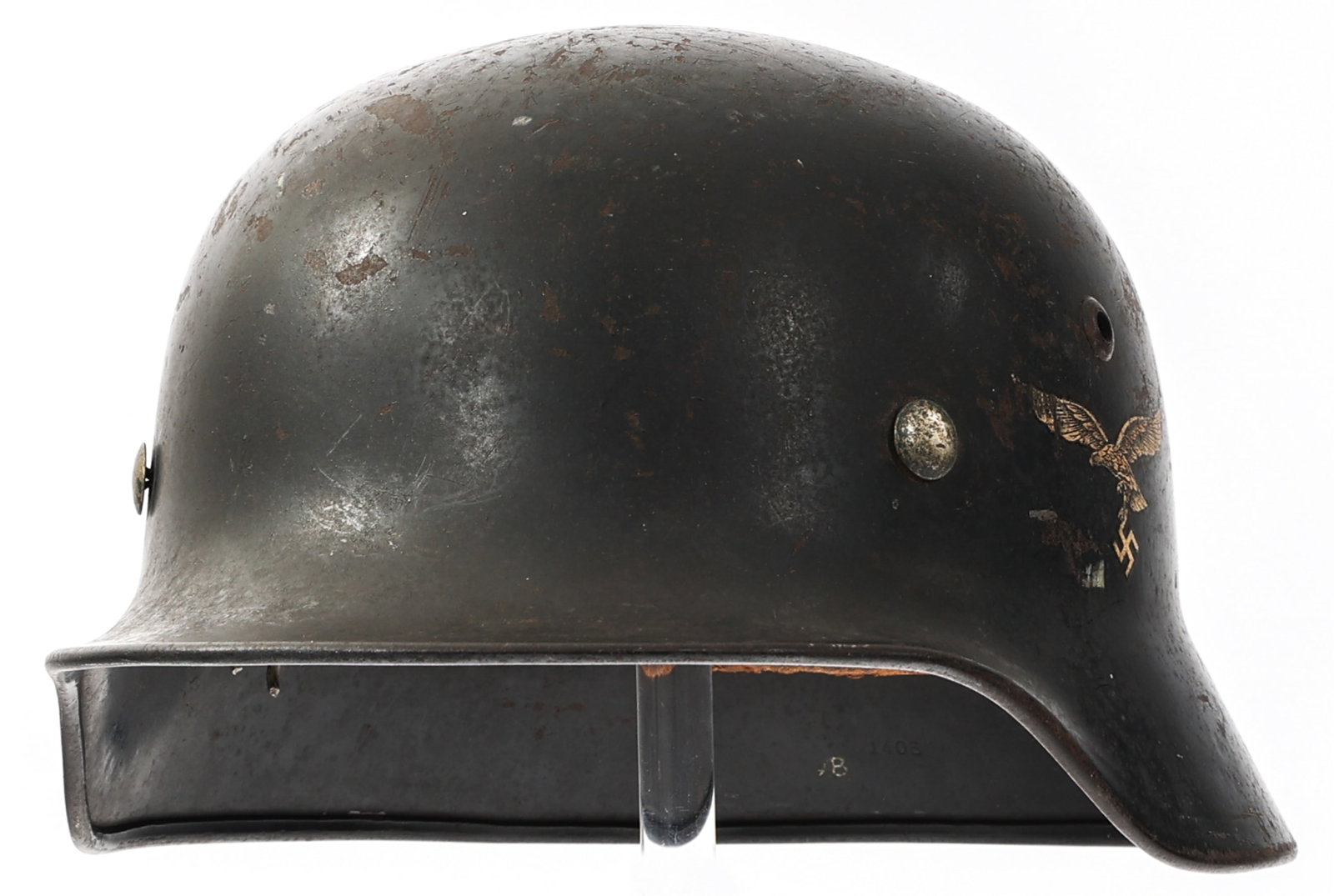 WWII GERMAN LUFTWAFFE M35 DD COMBAT HELMET: WWII GERMAN LUFTWAFFE M35 DD COMBAT HELMET WWII German Luftwaffe M35 Double Decal Combat Helmet. Luftwaffe and national tri-color decals below vent holes. "Q66" and "1406" stamped on the interior. Nin