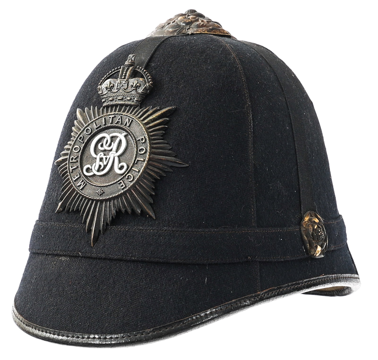 WWII BRITISH METROPOLITAN POLICE CUSTODIAN HELMET: WWII BRITISH METROPOLITAN POLICE CUSTODIAN HELMET WWII Era British Metropolitan Police Custodian Helmet. Felt and cotton construction with brass insignia. Leather sweatband is present. No chinstrap.