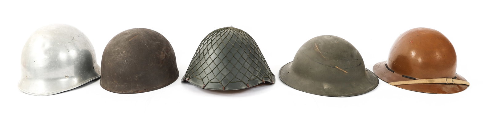 WWII - COLD WAR WORLD MILITARY HELMETS: WWII - COLD WAR WORLD MILITARY HELMETS WWII - Cold War World Military Helmets. (1) WWII Canadian Mk 1 Helmet by V.M.C. Leather liner with no chinstrap. (1) East German M56. Leather liner and chinstrap