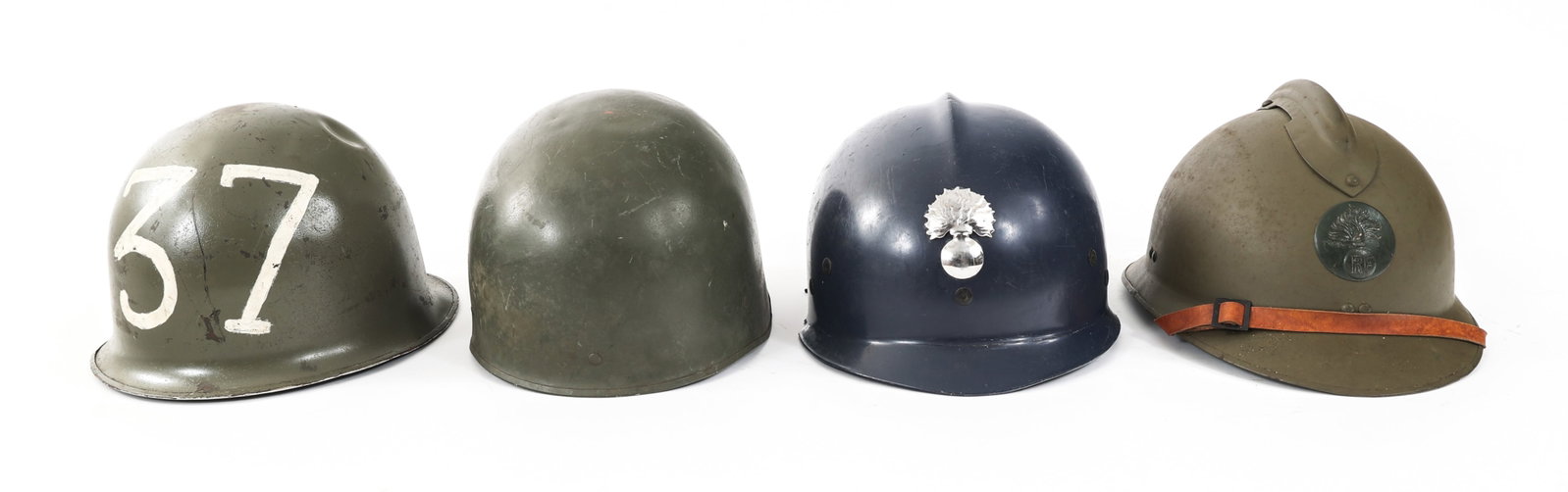 POST WWI - COLD WAR FRENCH HELMET LOT OF 4: POST WWI - COLD WAR FRENCH HELMET LOT OF 4 Lot of 4 Post WWI - Cold War French Helmets. (1) French M51 Helmet. (1) French M78 F1 Helmet. (1) Post War Plastic Riot Adrian Helmet. (1) French M26 Helmet.