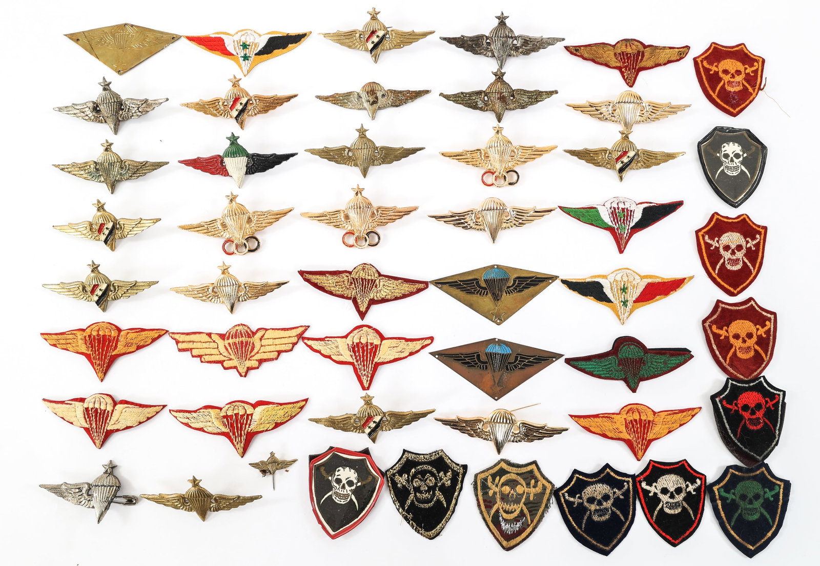 COLD WAR - CURRENT SYRIAN PARATROOPER INSIGNIA: COLD WAR - CURRENT SYRIAN PARATROOPER INSIGNIA Cold War - Current Syrian Paratrooper, Republican Guard, and Defense Company Insignia. Includes jump wings, badges, patches, and more.