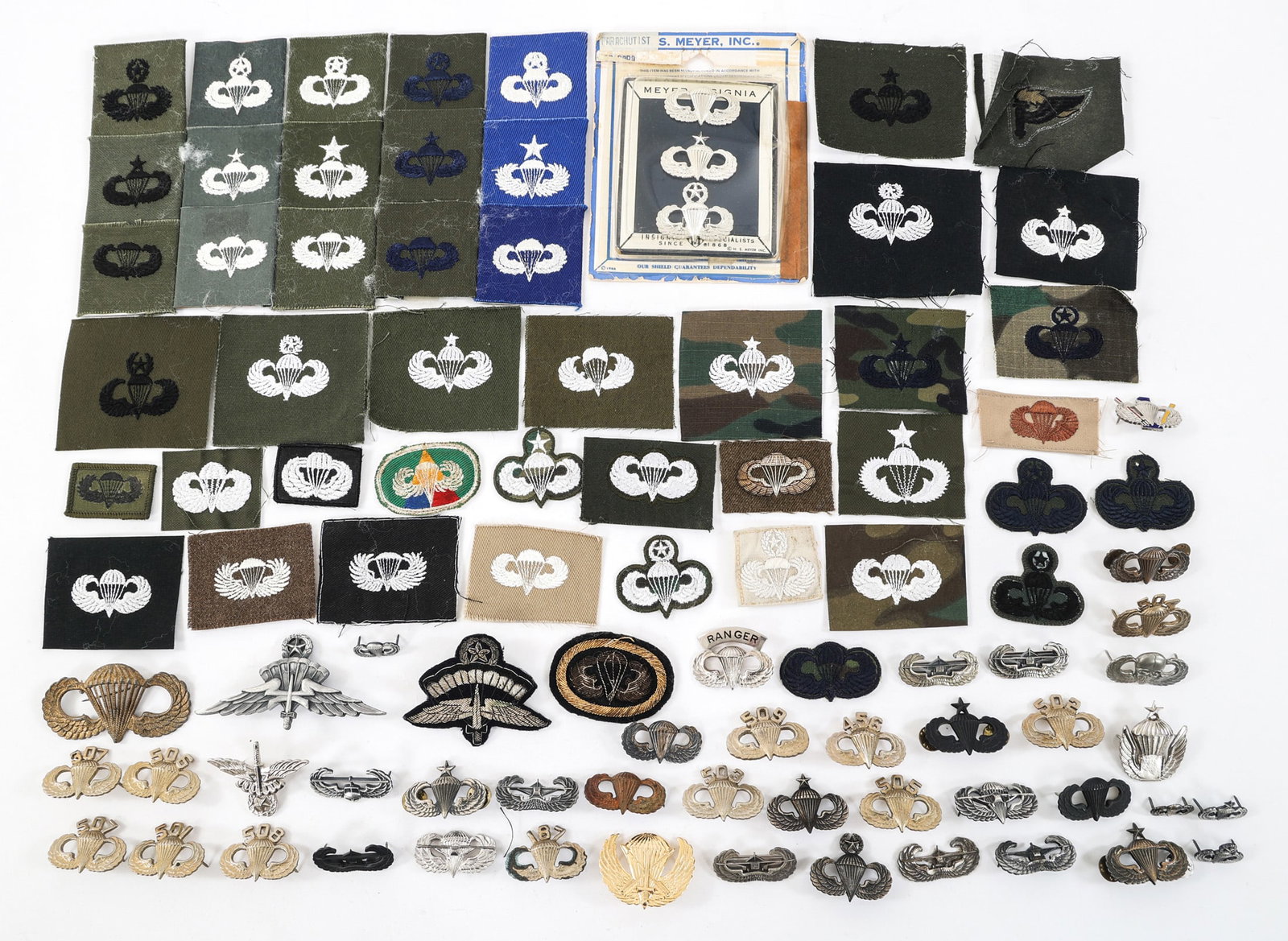 WWII - COLD WAR US ARMY AIRBORNE & NOVELTY WINGS: WWII - COLD WAR US ARMY AIRBORNE & NOVELTY WINGS WWII - Cold War US Army Airborne and Novelty Wings and Patches. Including Glider troop, Paratrooper, Air Assault and Novelty wings and patches.
