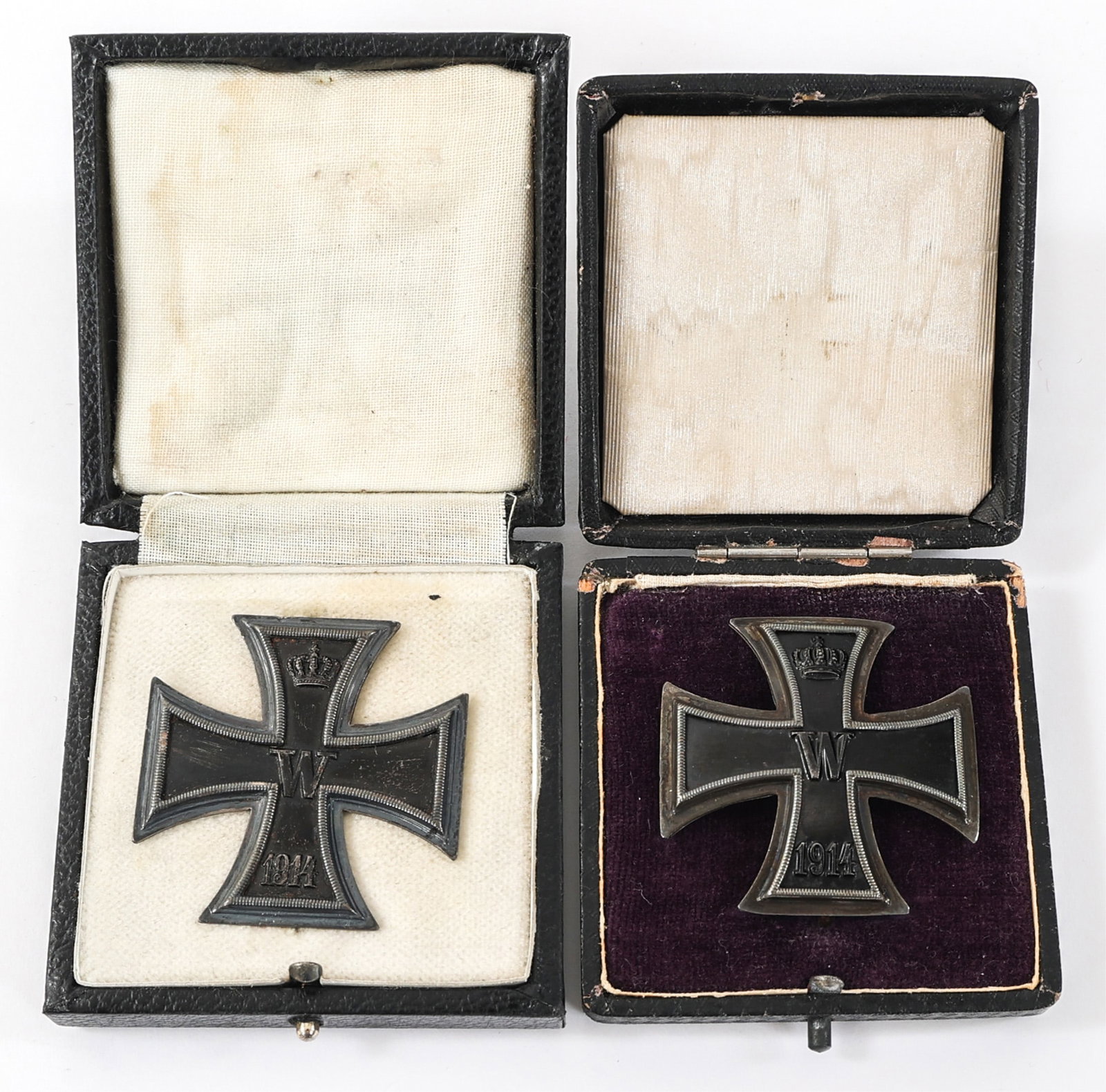 WWI IMPERIAL GERMAN 1st CLASS IRON CROSSES & CASES: WWI IMPERIAL GERMAN 1st CLASS IRON CROSSES & CASES WWI Imperial German 1st Class Iron Crosses with Cases. One is marked "935" and the other has no visible marks/stamps.