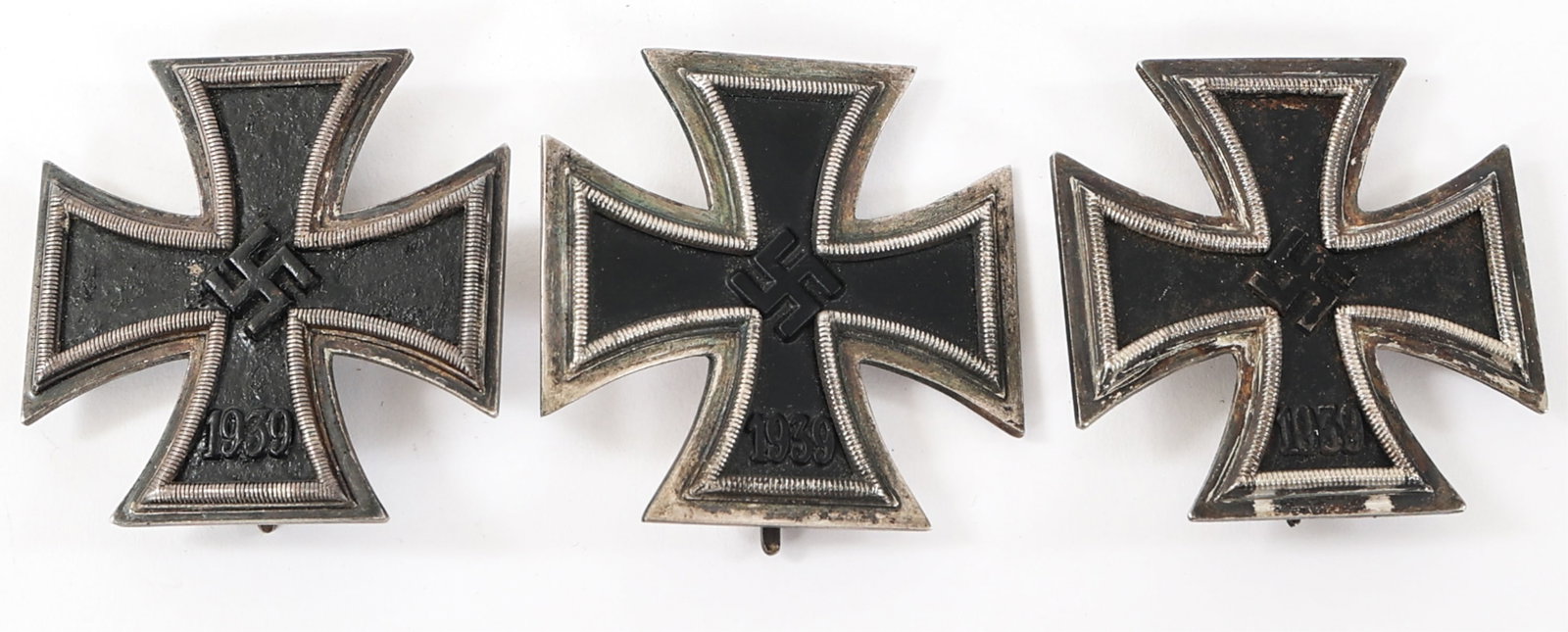 WWII GERMAN 1st CLASS IRON CROSSES: WWII GERMAN 1st CLASS IRON CROSSES WWII German 1st Class Iron Crosses. One is maker marked "20", another "4", and one has no visible marks/stamps.