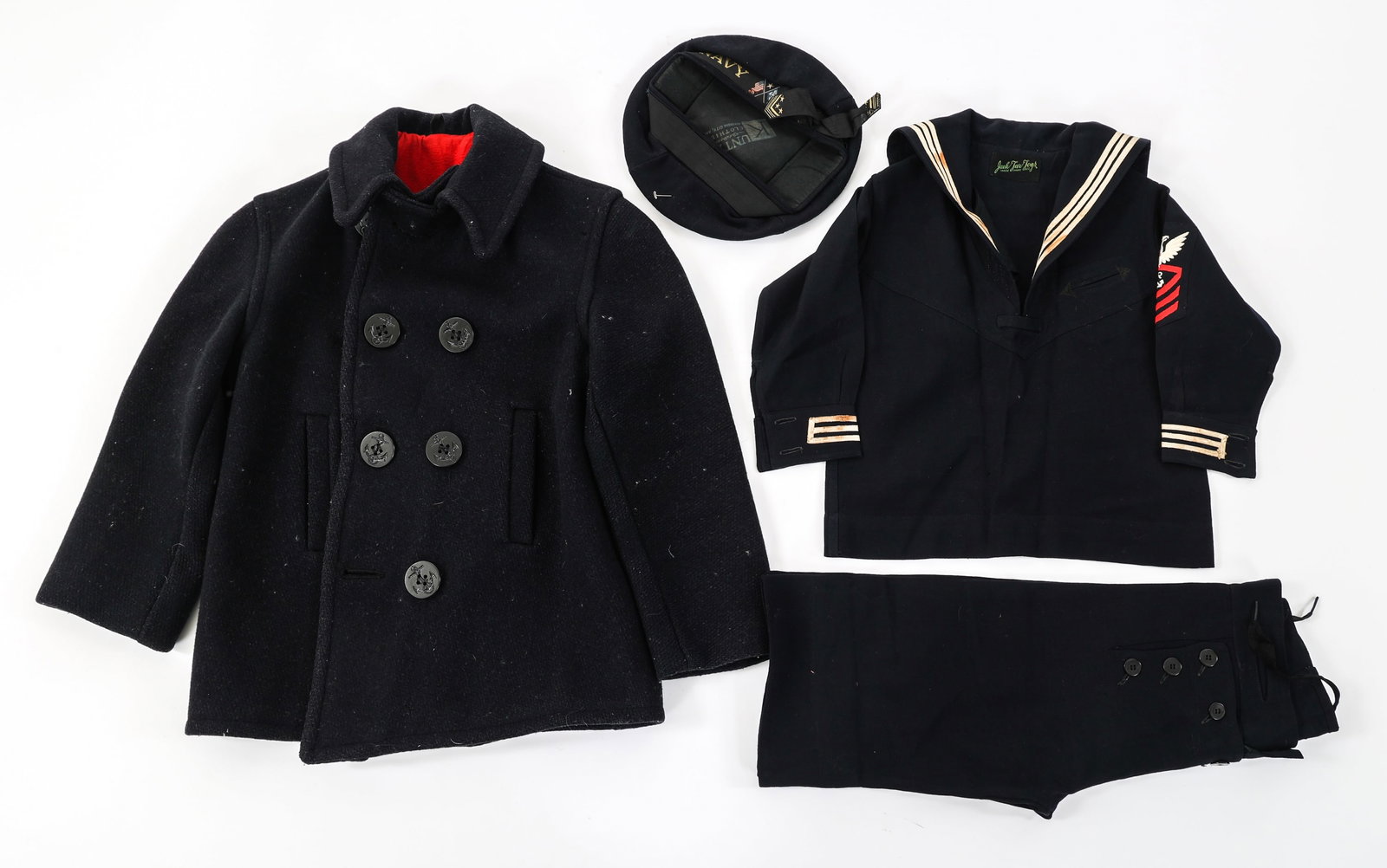 WWII US NAVY CHIEF CHILD'S UNIFORM: WWII US NAVY CHIEF CHILD'S UNIFORM WWII US Navy Chief Child's Uniform. (1) "Donald Duck" Hat. (1) US Navy Blouse. (1) Pair of Trousers. (1) Peacoat. | Size: X Small