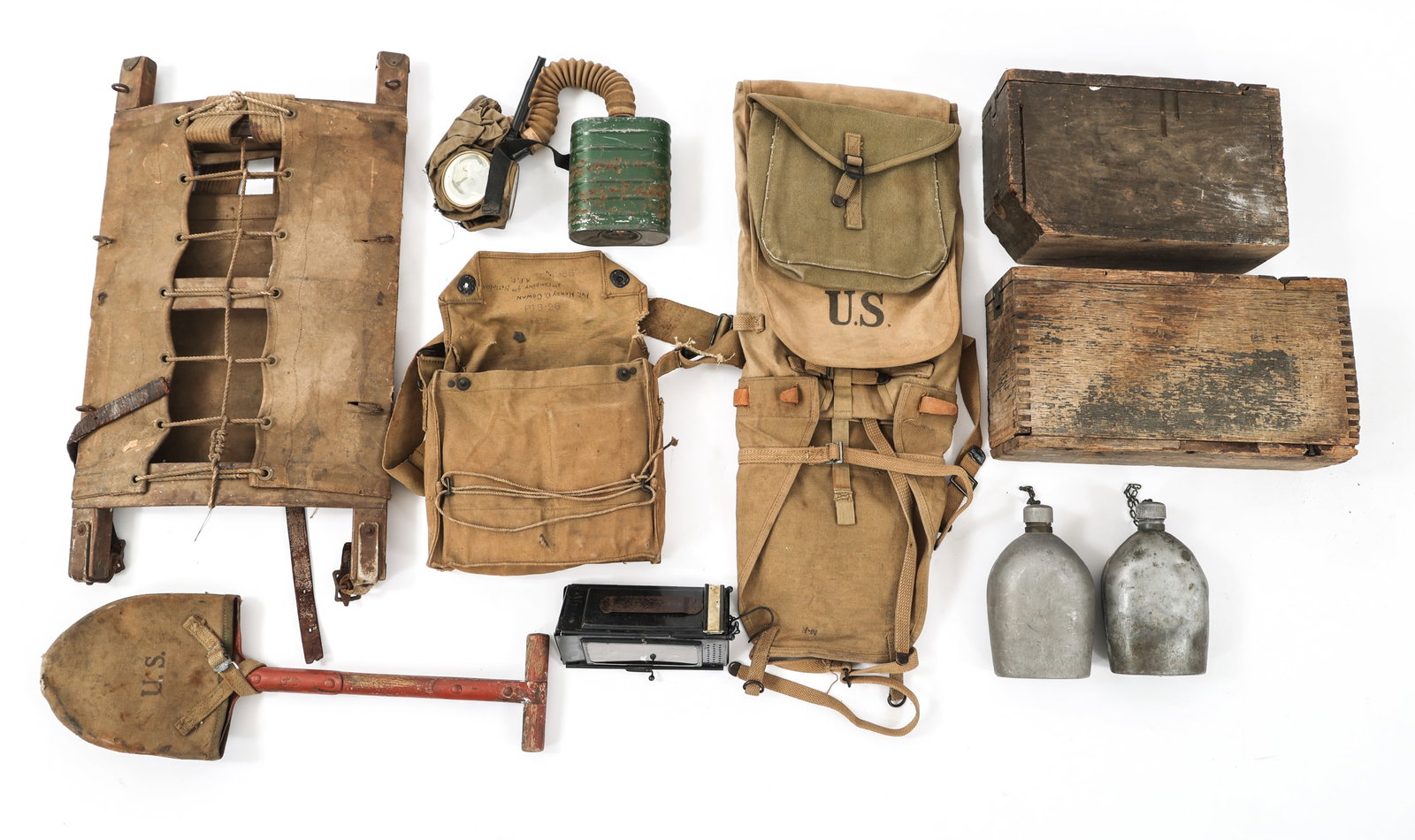 WWI US ARMY AEF PACK BOARD & FIELD GEAR: WWI US ARMY AEF PACK BOARD & FIELD GEAR WWII US Army Expeditionary Force Field Gear. Includes M1910 canteens, pack board, entrenching shovel, carrying bags, Alpina lantern, ammo boxes and more.