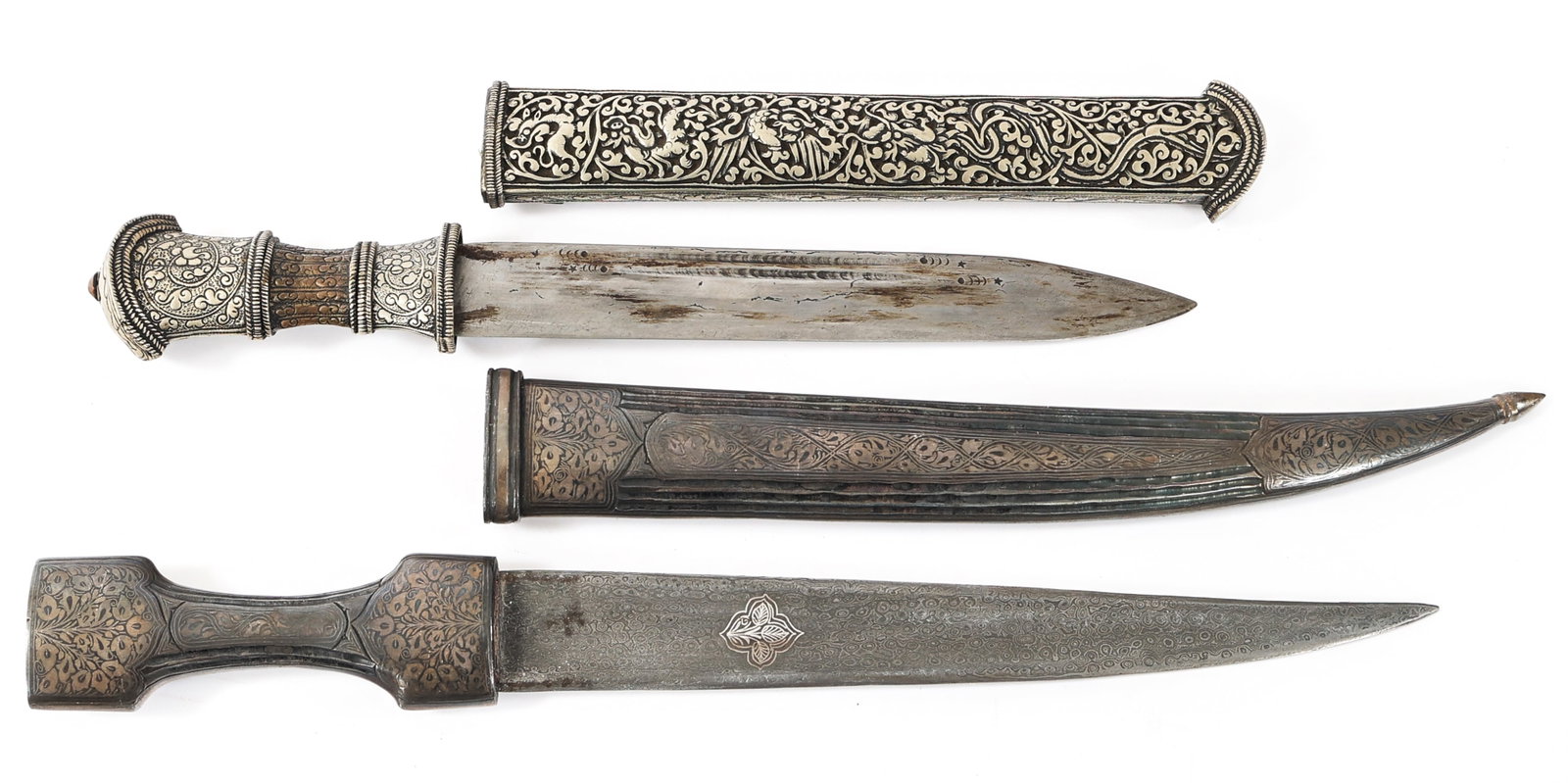 19th - 20th C. SAUDI JAMBIYA & TIBETAN KHAMPA: 19th - 20th C. SAUDI JAMBIYA & TIBETAN KHAMPA Late 19th - Early 20th Century Saudi Jambiya and Tibetan Khampa Daggers. (1) Jambiya. Single edged, curved, acid etched blade. Decorated alloy hilt and sc