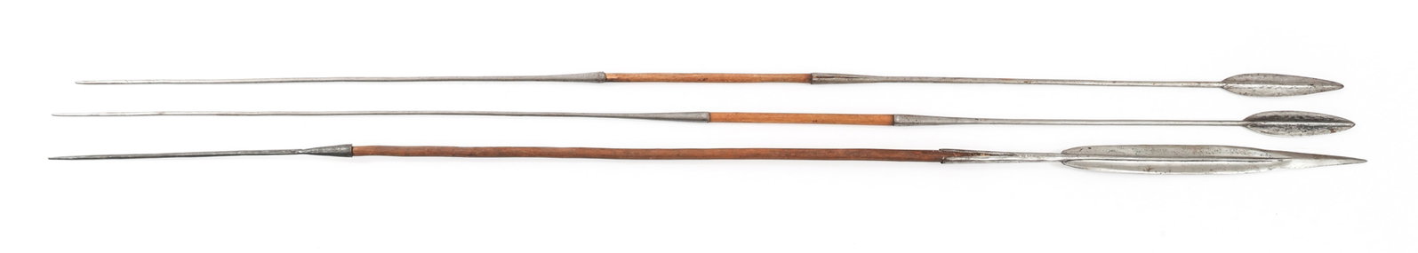 AFRICAN MAASAI LION SPEARS: AFRICAN MAASAI LION SPEARS African Maasai Lion Spears. Steel spear heads, wood shafts, and spiked steel ends. Blade Length: 7 1/2" to 20 1/2" | Total Length: 85" to 87"