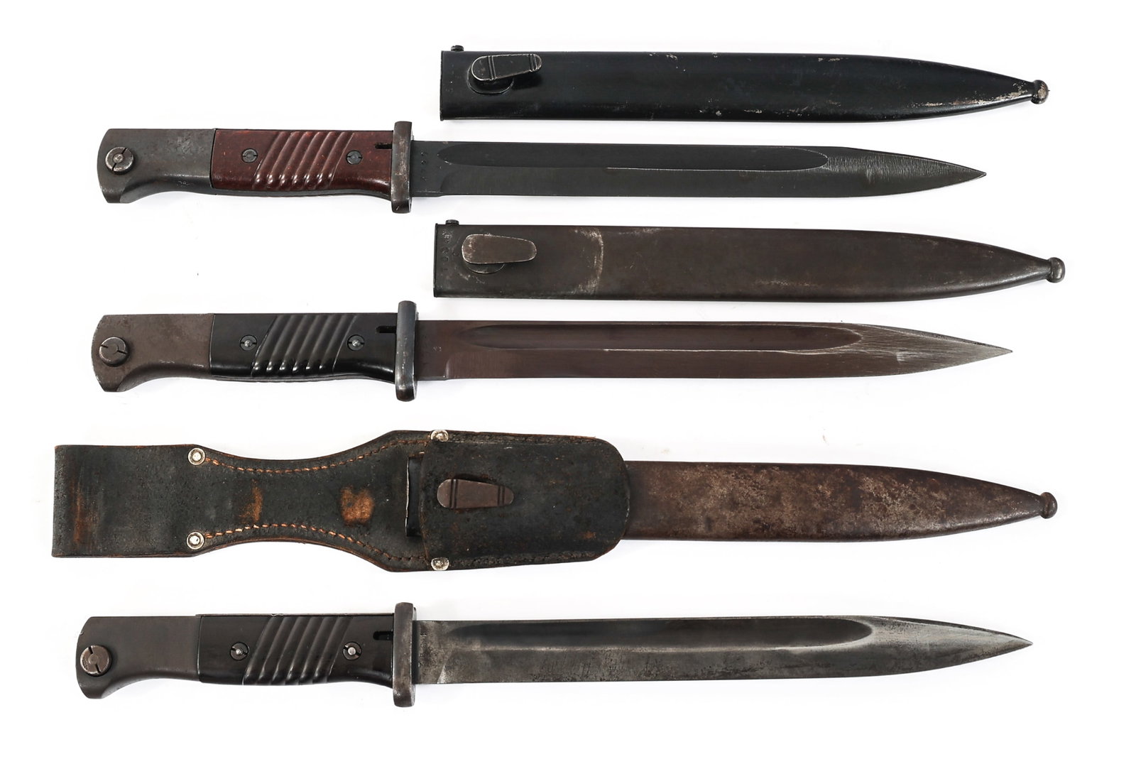 WWII GERMAN K98 BAYONETS: WWII GERMAN K98 BAYONETS WWII German K98 Bayonets. (1) K98 Bayonet. Blued blade. Maker marked "42asw". Blued steel hilt with black composite grip. Waffenamt stamps on the pommel. Steel scabbard with m