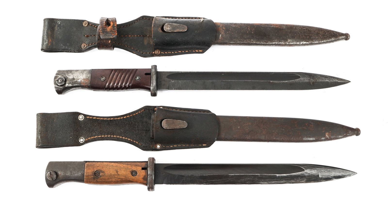 WWII GERMAN K98 COMBAT BAYONETS: WWII GERMAN K98 COMBAT BAYONETS WWII German K98 Combat Bayonets. (1) K98 Bayonet. Single edged, blued blade with fuller. "42 cof" stamped on one side of the ricasso and "1354 V" on the reverse. Blued 