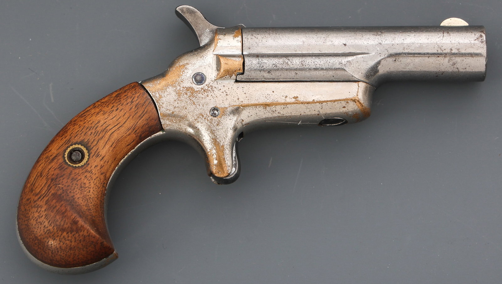 COLT THIRD MODEL .41 CALIBER DERRINGER: COLT THIRD MODEL .41 CALIBER DERRINGER Colt Third Model .41 RF caliber derringer. "Colt" marked on top barrel. Serial number on butt. Nickel finish. Wood grips. Caliber / Gauge: 41 | Barrel Length: 2.