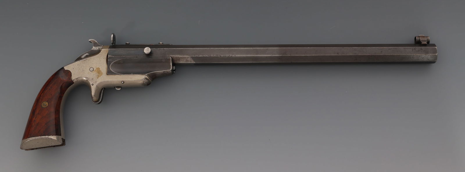 FRANK WESSON MODEL 1870 .22 POCKET RIFLE: FRANK WESSON MODEL 1870 .22 POCKET RIFLE Frank Wesson Model 1870 .22 caliber single shot pocket rifle. Blued finish. Covered front sight. Adjustable rear sight. Serial numbers match on barrel and fram