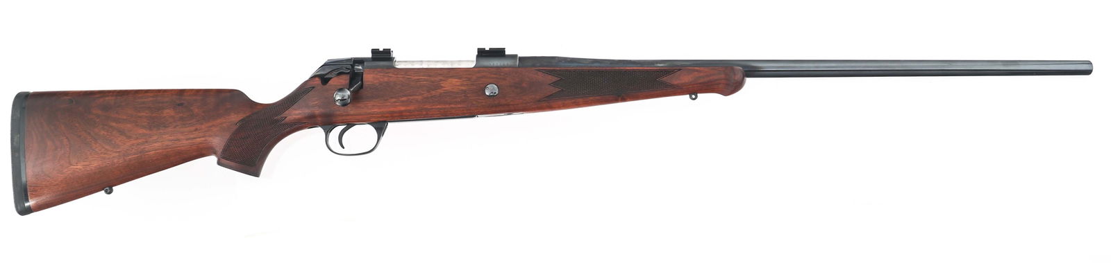 MAUSER MODEL 99 .338 WIN MAG CALIBER RIFLE: MAUSER MODEL 99 .338 WIN MAG CALIBER RIFLE Mauser Model 99 .338 Win magnum caliber bolt action rifle. Blued finish. KB date code. Precision Imports mark. Jeweled bolt. Checkered wood stock. Sling stud