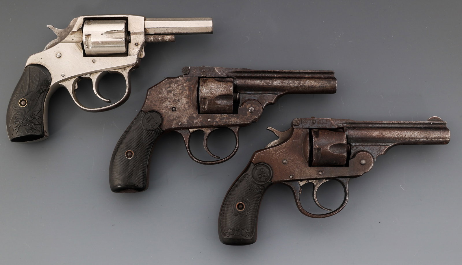 US REVOLVER AND IVER JOHNSON REVOLVERS FOR PARTS: US REVOLVER AND IVER JOHNSON REVOLVERS FOR PARTS Three revolver for parts or repair. A) Iver Johnson Model Bulldog .32 caliber double action revolver. Nickel plated. Composite grip with eagle. Missing
