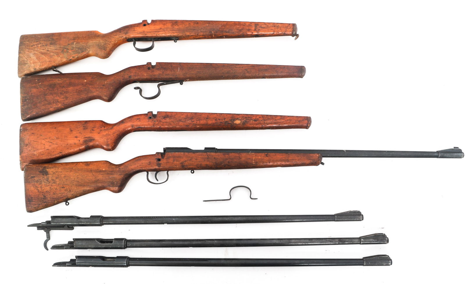 ROMANIAN UMC CUGIR TRAINING RIFLES FOR PARTS: ROMANIAN UMC CUGIR TRAINING RIFLES FOR PARTS Romanian UMC Cugir .22 LR Training rifles for parts or repair lot of 4. A) 1955 Romanian UMC Cugir .22 LR caliber bolt action training rifle. Serial number