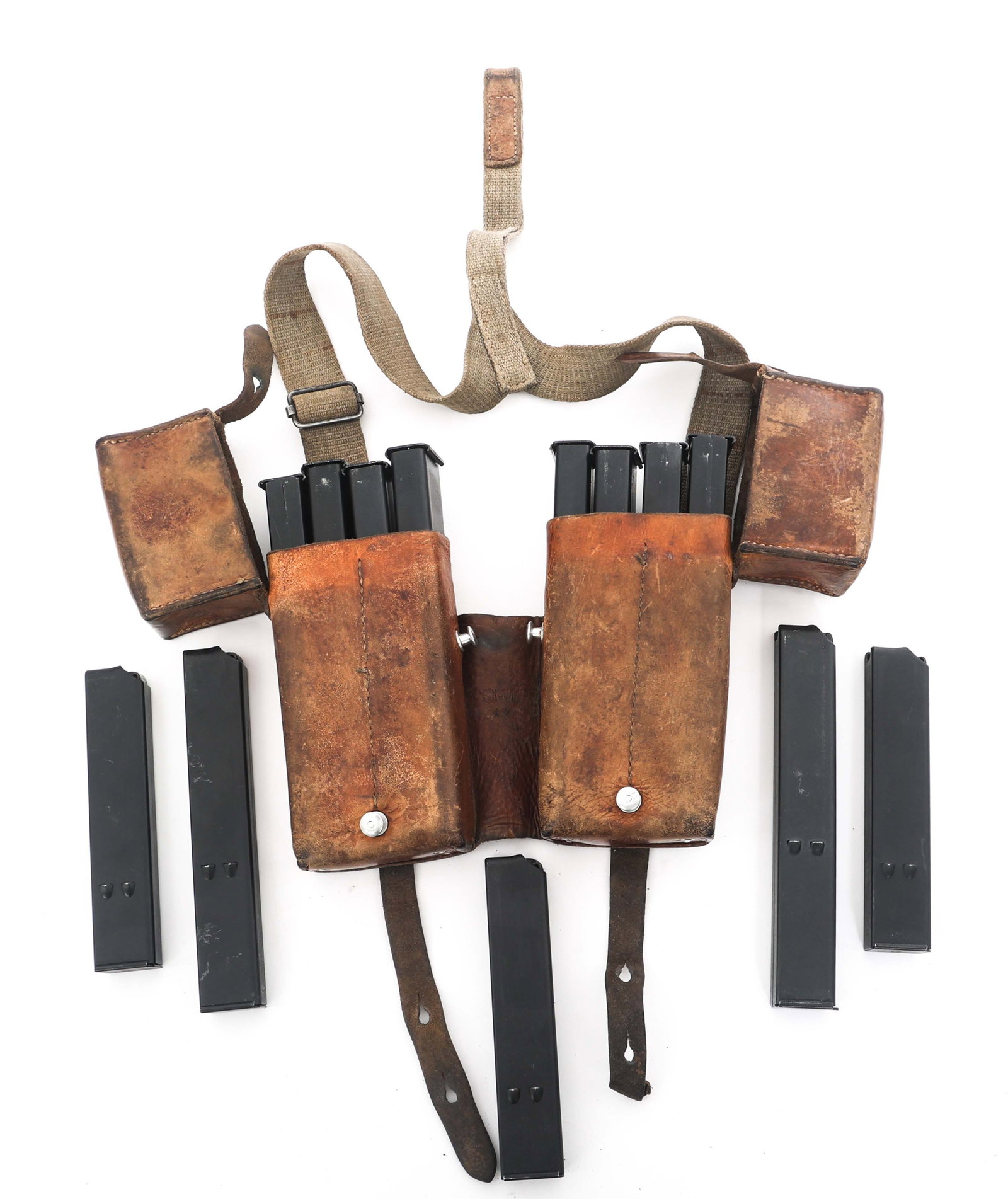 UZI 9mm CARBINE MAGAZINES: UZI 9mm CARBINE MAGAZINES UZI 9mm carbine magazine lot. Ten 32 round magazines in leather pouch. Three 25 round magazines. Size / Gauge: 9mm