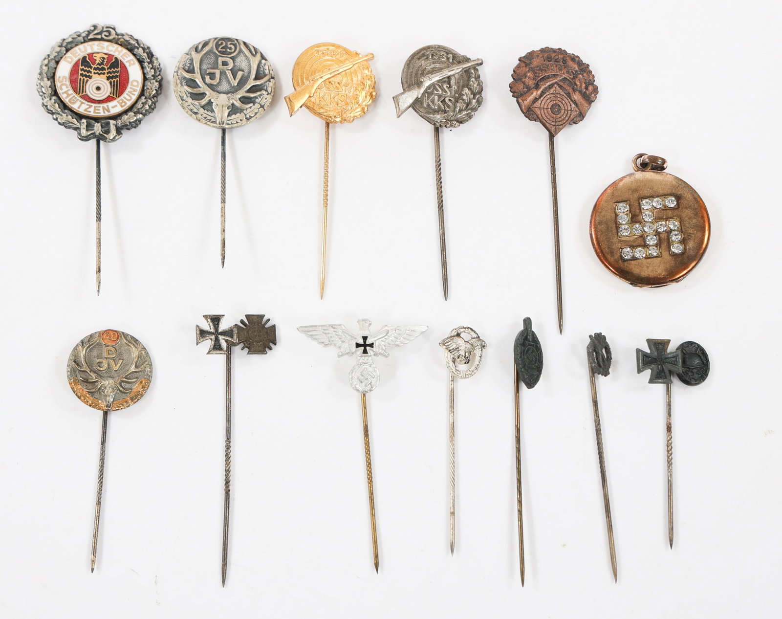 WWI - WWII GERMAN STICK PINS & SWEETHEART LOCKET: WWI - WWII GERMAN STICK PINS & SWEETHEART LOCKET WWI - WWII German Stick Pins and Sweetheart Locket. Stick Pins include Iron Cross, Knights Cross, Infantry Assault, S.S.f.K.K.S. Target, Schutzen-Bund,