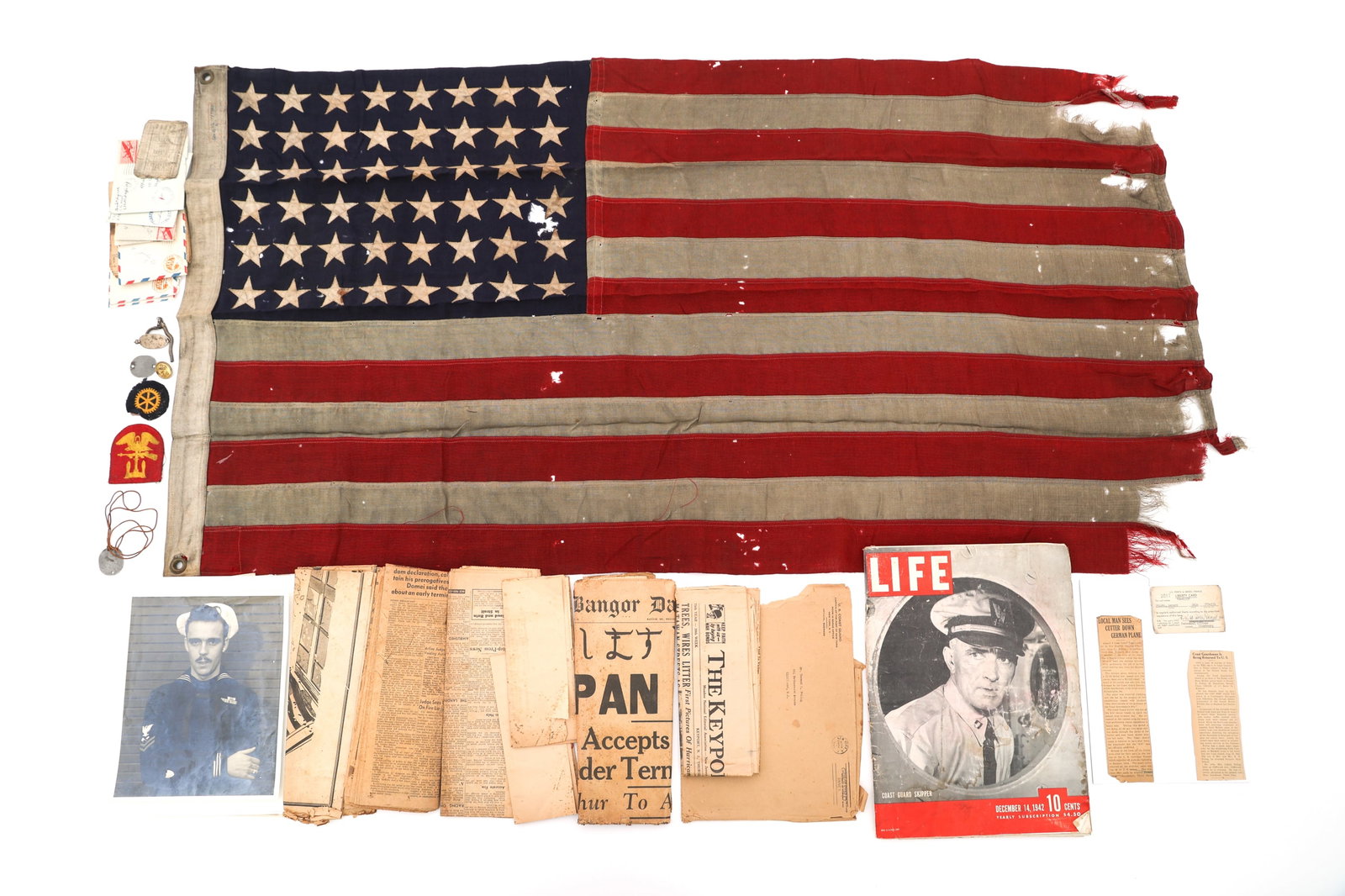 WWII D-DAY FLOWN FLAG USCG-7 (83337) - OMAHA BEACH: WWII D-DAY FLOWN FLAG USCG-7 (83337) - OMAHA BEACH Historically important WWII D-Day Flown Flag of Rescue Flotilla One Cutter USCG-7 (83337) - Omaha Beach Invasion of Normandy and archive grouping of 