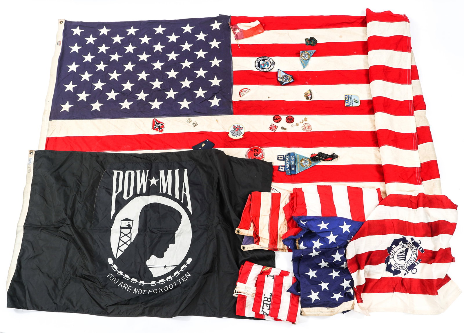 COLD WAR US ARMED FORCES FLAGS LOT OF 7: COLD WAR US ARMED FORCES FLAGS LOT OF 7 Cold War US Armed Forces Flags, Lot of 7. Includes 50 star American flags, POW MIA flag, US Coast Guard Flag, Patriotic flags and more. Size: 22" x 31" to 54" x