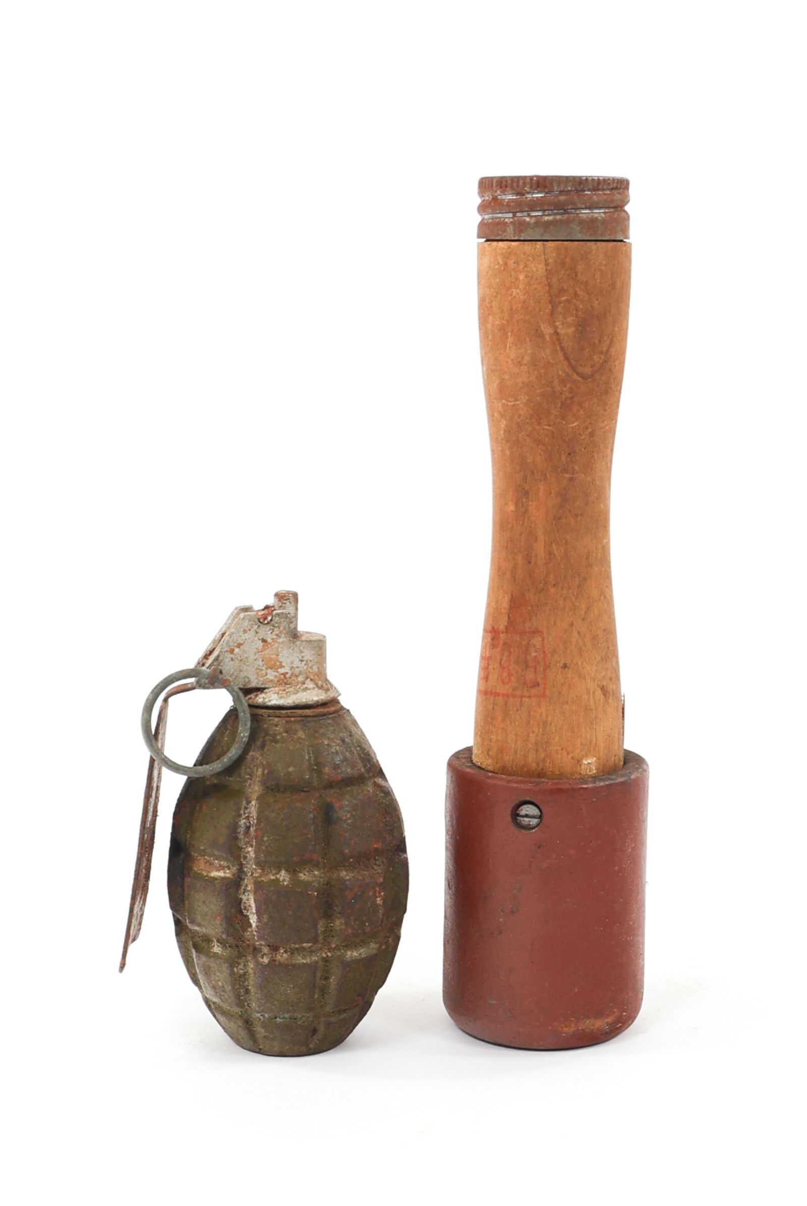 VIETNAM WAR NVA STICK & FRAG HAND GRENADES: VIETNAM WAR NVA STICK & FRAG HAND GRENADES Vietnam War North Vietnamese Army Stick and Hand Grenades. (1) ChiCom Type 67 Stick Grenade. (1) NVA Frag Grenade.
