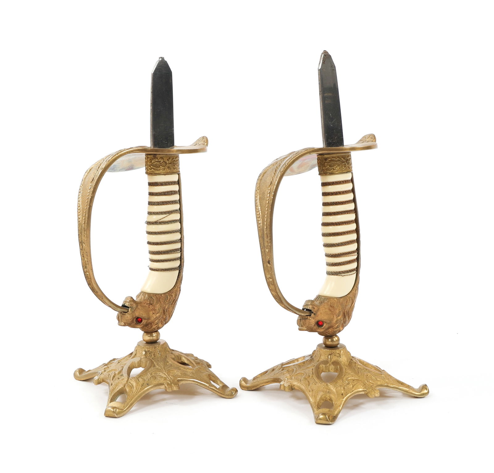 IMPERIAL GERMAN NAVY OFFICER SWORD CANDLESTICKS: IMPERIAL GERMAN NAVY OFFICER SWORD CANDLESTICKS WWI Imperial German Navy Officer Sword Candlesticks. Cut down blade. Brass "D" guard with Imperial German Naval anchor. Twisted wire wrapped grip and ru