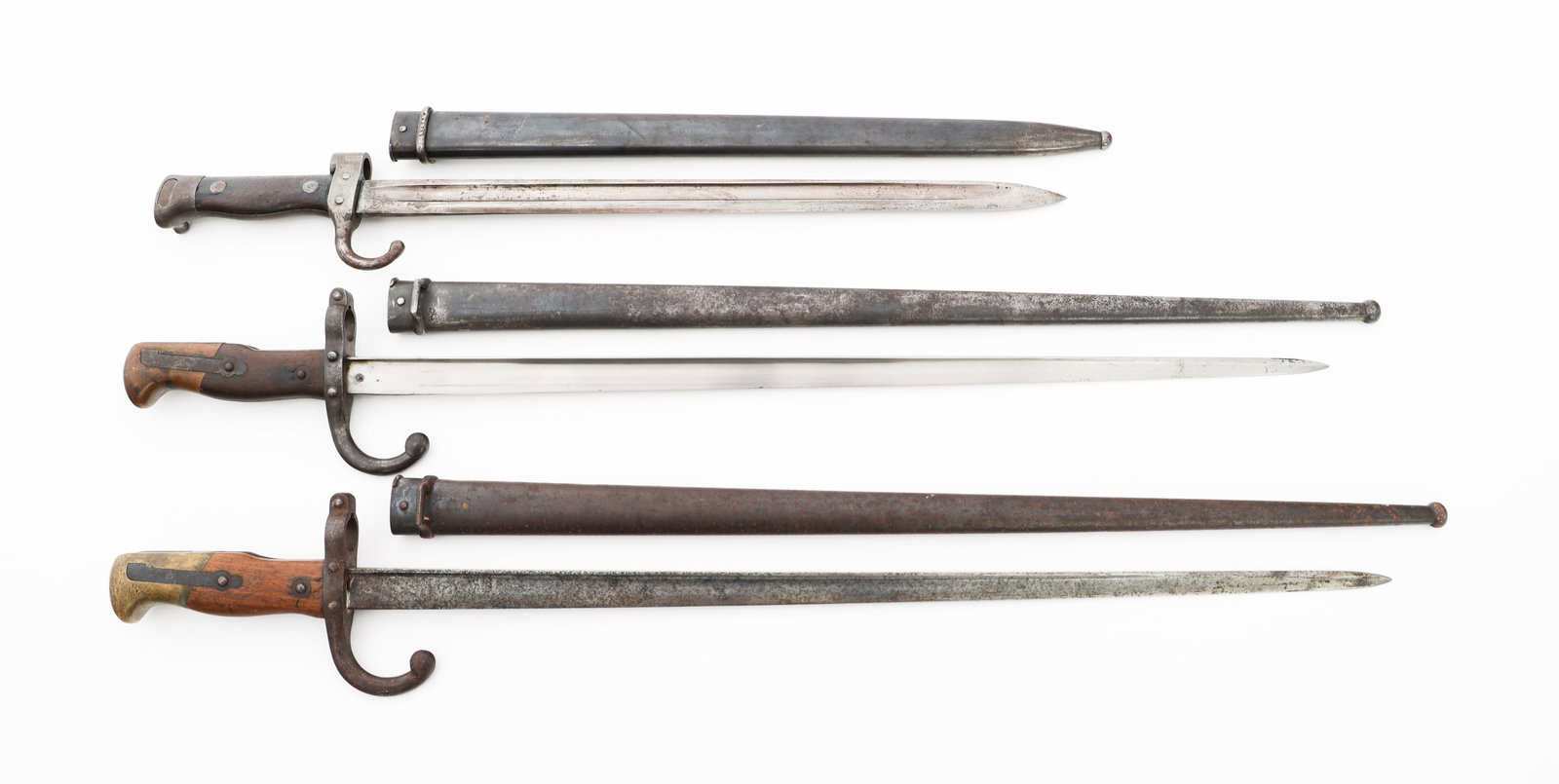 19th C. FRENCH M1874 GRAS & M1892 BAYONETS: 19th C. FRENCH M1874 GRAS & M1892 BAYONETS 19th Century French M1874 Gras and M1892 Bayonets. (1) M1874 Gras Bayonet. Bright, straight, T-back blade. Maker marked on the spine "Manufacture d?Armes de 