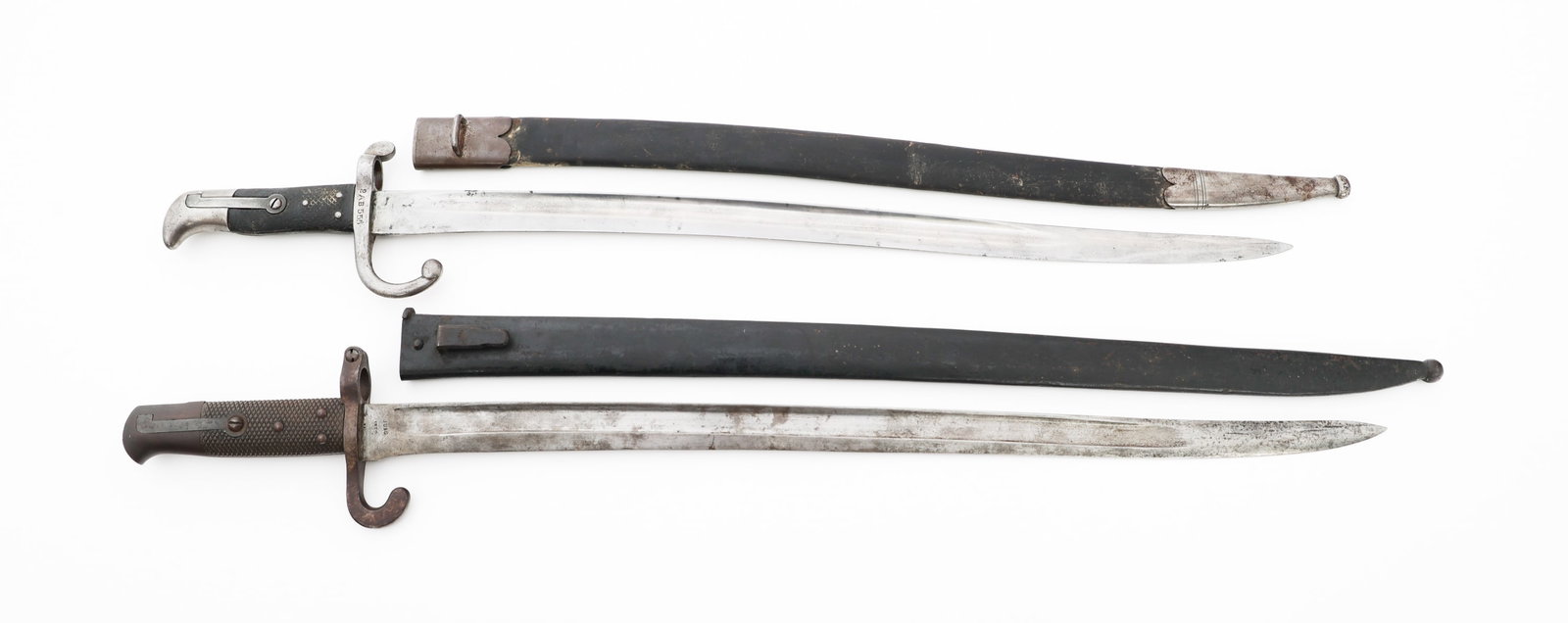 19th C. AUSTRIAN & DANISH YATAGHAN BAYONETS: 19th C. AUSTRIAN & DANISH YATAGHAN BAYONETS 19th Century Austrian and Danish Yataghan Bayonets. (1) Austrian M1870 Yataghan Bayonet. Single edged, bright blade with fuller. "Jung" stamped on the ricas