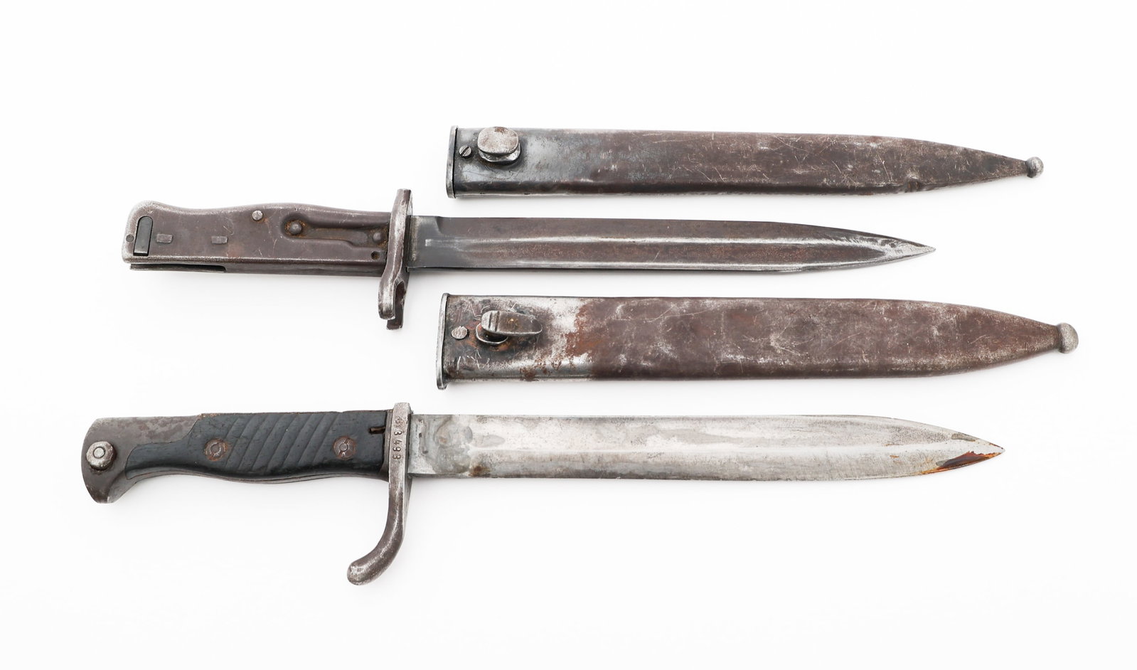 WWI IMPERIAL GERMAN M1898 & ERSATZ BAYONETS: WWI IMPERIAL GERMAN M1898 & ERSATZ BAYONETS WWI Imperial German M1898 and Ersatz Bayonets. (1) M1898. Maker mark of Waffenfabrik Mauser A.G. stamped on the ricasso. Serial number stamped on the guard.