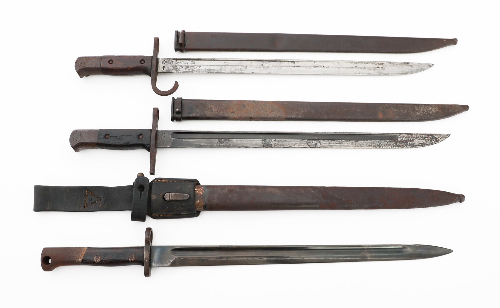 WWII IMPERIAL JAPANESE TYPE 30 & MAUSER BAYONETS: WWII IMPERIAL JAPANESE TYPE 30 & MAUSER BAYONETS WWII Imperial Japanese Type 30 and South American Mauser Bayonets. (1) Type 30 Bayonet. Single edged, bright blade with fuller. Factory stamp of Tokyo 