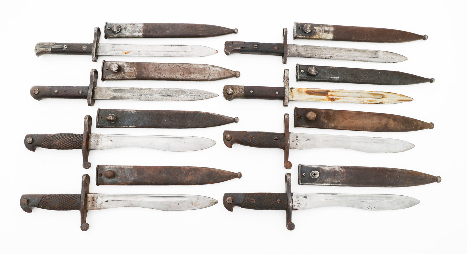 WWII TURKISH & SPANISH BAYONETS WITH SCABBARDS: WWII TURKISH & SPANISH BAYONETS WITH SCABBARDS WWII Turkish & Spanish Bayonets with Scabbards. Includes Spanish M1941 and Turkish M1935 bayonets. Blade Length: 9 3/4" to 9 7/8" Total Length: 14 1/2" t