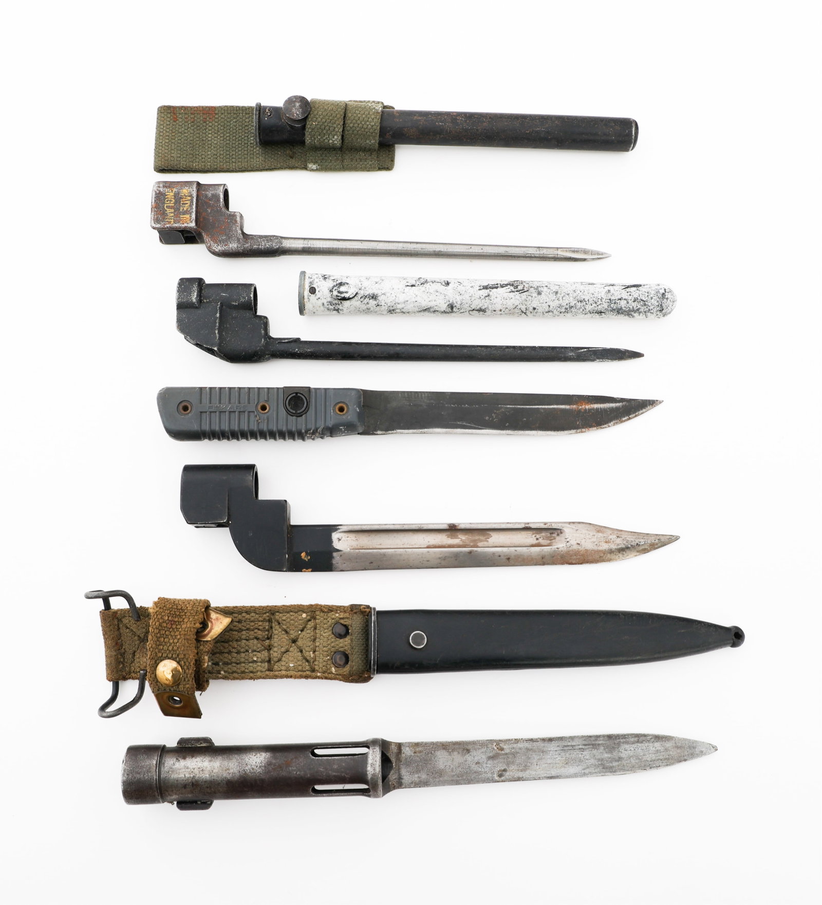 COLD WAR BRITISH, FINNISH, & BELGIAN BAYONETS: COLD WAR BRITISH, FINNISH, & BELGIAN BAYONETS Cold War British, Finnish and Belgian Bayonets. (1) British No. 4 Mk 2 Spike Bayonet. Proof stamps present near the socket. Steel scabbard. (1) British No