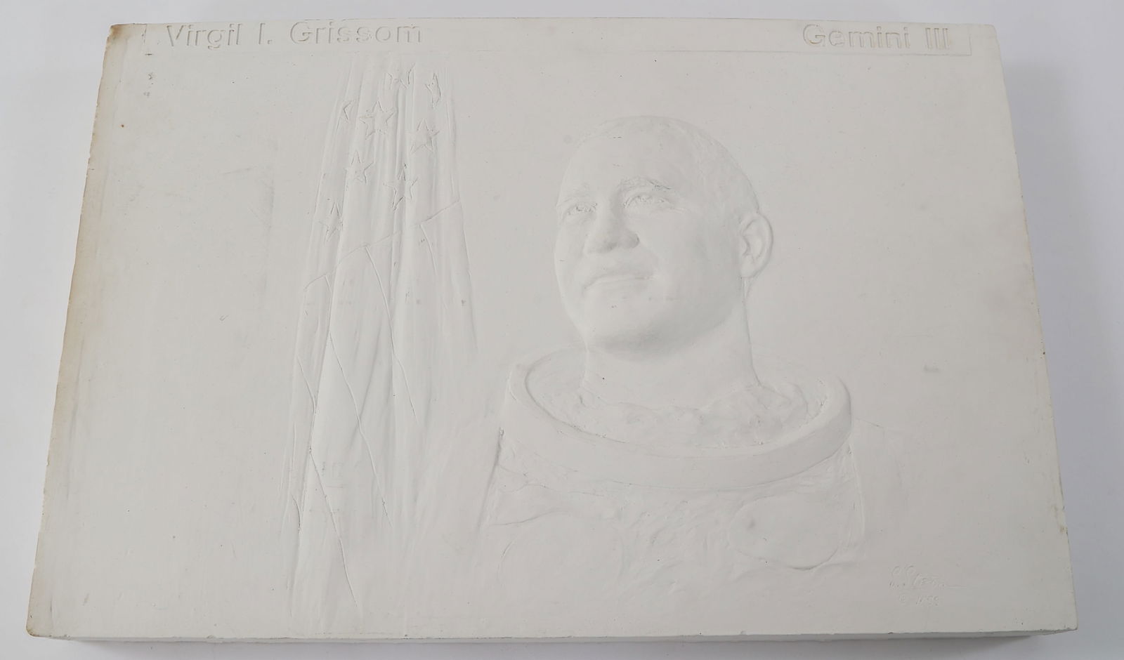 ASTRONAUT & USAF PILOT GUS GRISSOM PLASTER PLAQUE: ASTRONAUT & USAF PILOT GUS GRISSOM PLASTER PLAQUE WWII - Korean War US Air Force Pilot and Astronaut Virgil "Gus" Grissom Plaster Plaque. Handmade, molded plaster plaque of Grissom. Signature of the a