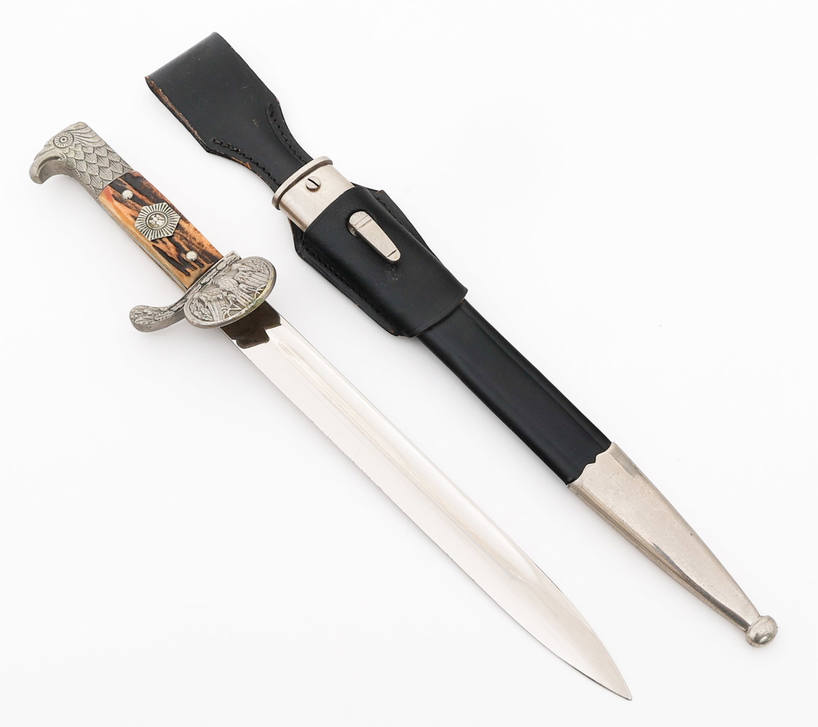 WEIMAR REPUBLIC POLICE CLAMSHELL DRESS BAYONET: WEIMAR REPUBLIC POLICE CLAMSHELL DRESS BAYONET German Weimar Republic Police Clamshell Dress Bayonet. Single edged, bright blade with fuller. Maker mark of Carl Eickhorn present on the ricasso. Leathe