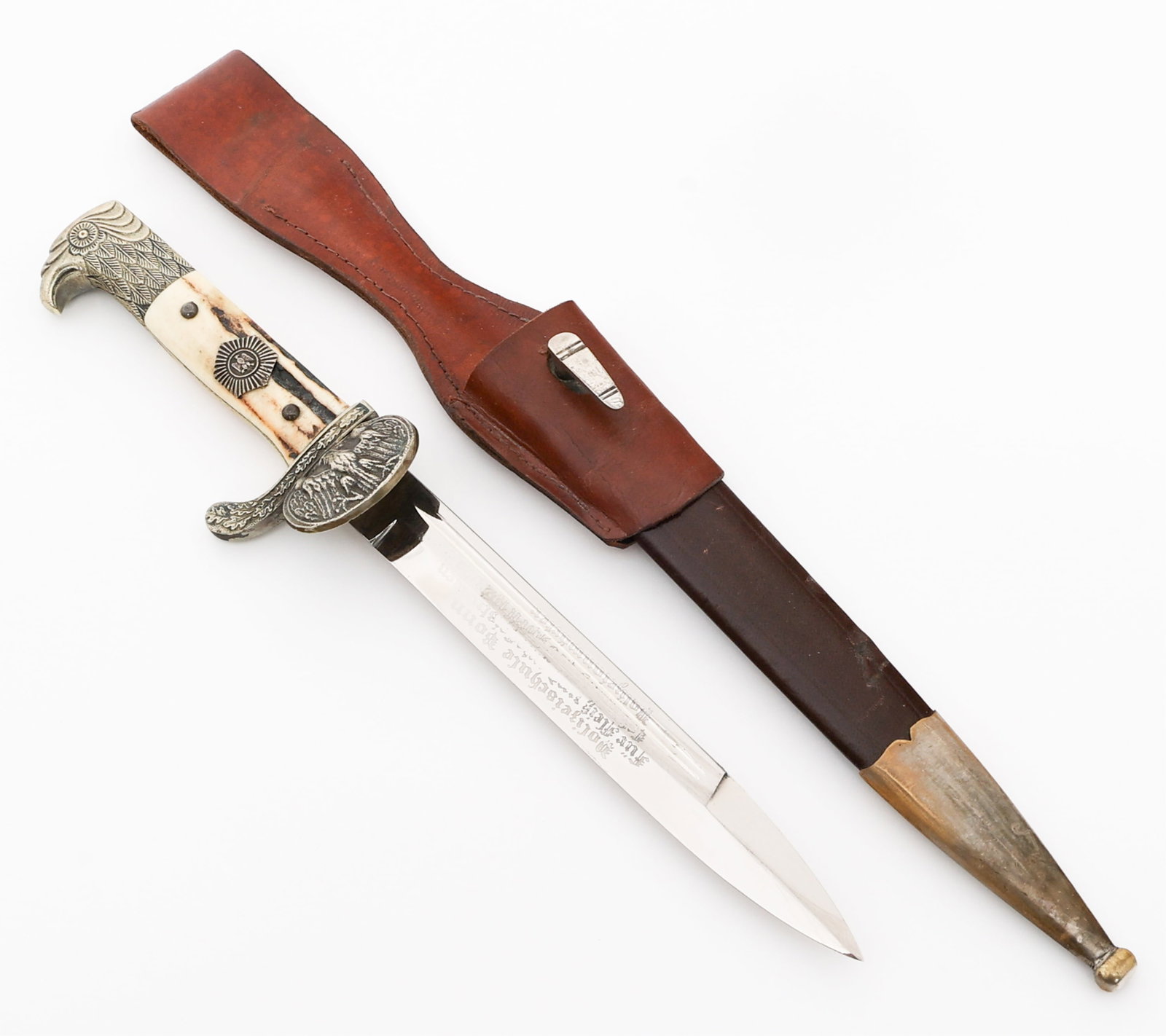 WEIMAR REPUBLIC POLICE DEDICATION DRESS BAYONET: WEIMAR REPUBLIC POLICE DEDICATION DRESS BAYONET German Weimar Republic Police Clamshell Dress Bayonet. Single edged, bright blade with fuller. Acid etched partially visible dedication on the blade. Da