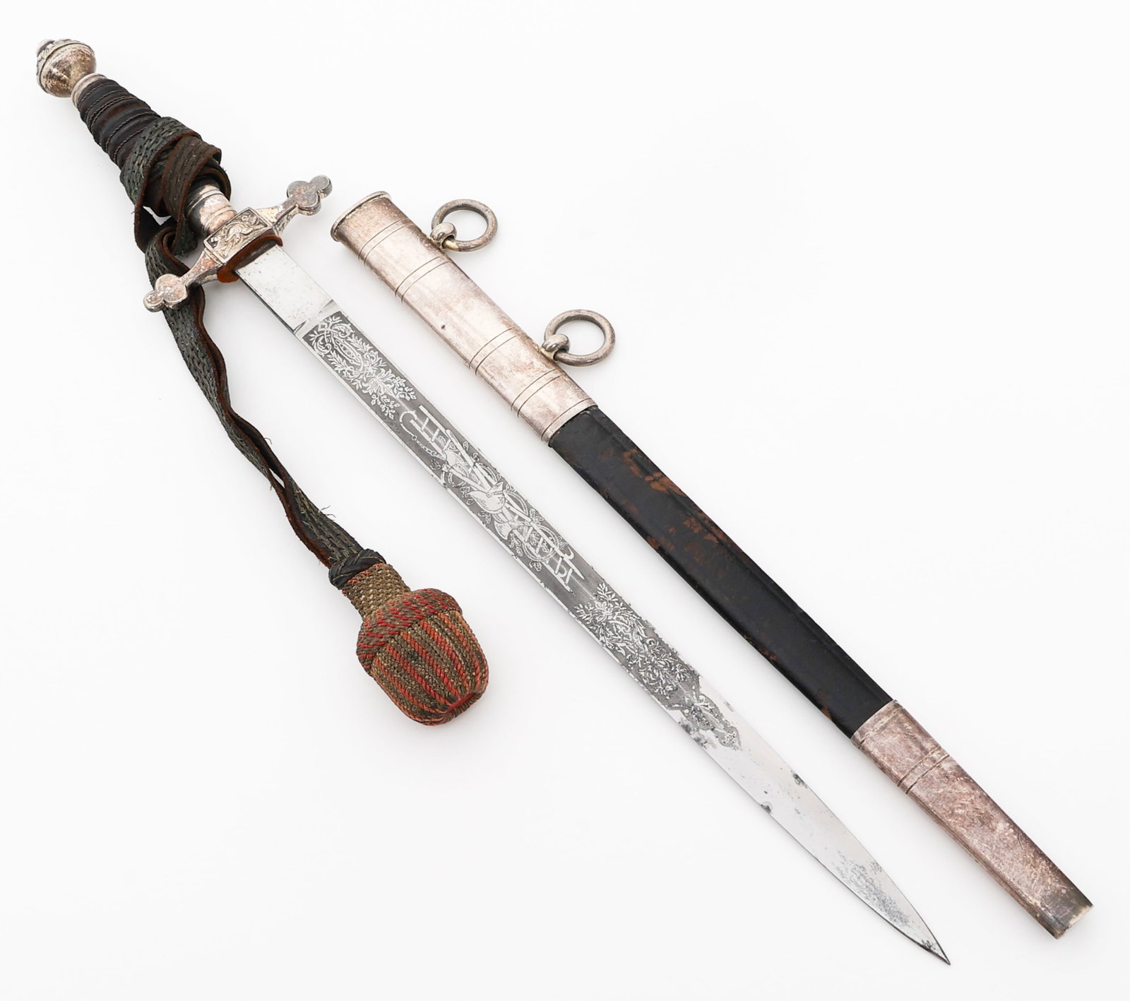 WEIMAR REPUBLIC FIRE OFFICIAL'S DRESS DAGGER: WEIMAR REPUBLIC FIRE OFFICIAL'S DRESS DAGGER German Weimar Republic Fire Official's Dress Dagger. Double edged, bright blade. Dual acid etched with Fireman's ladder and floral patterns. No visible mak