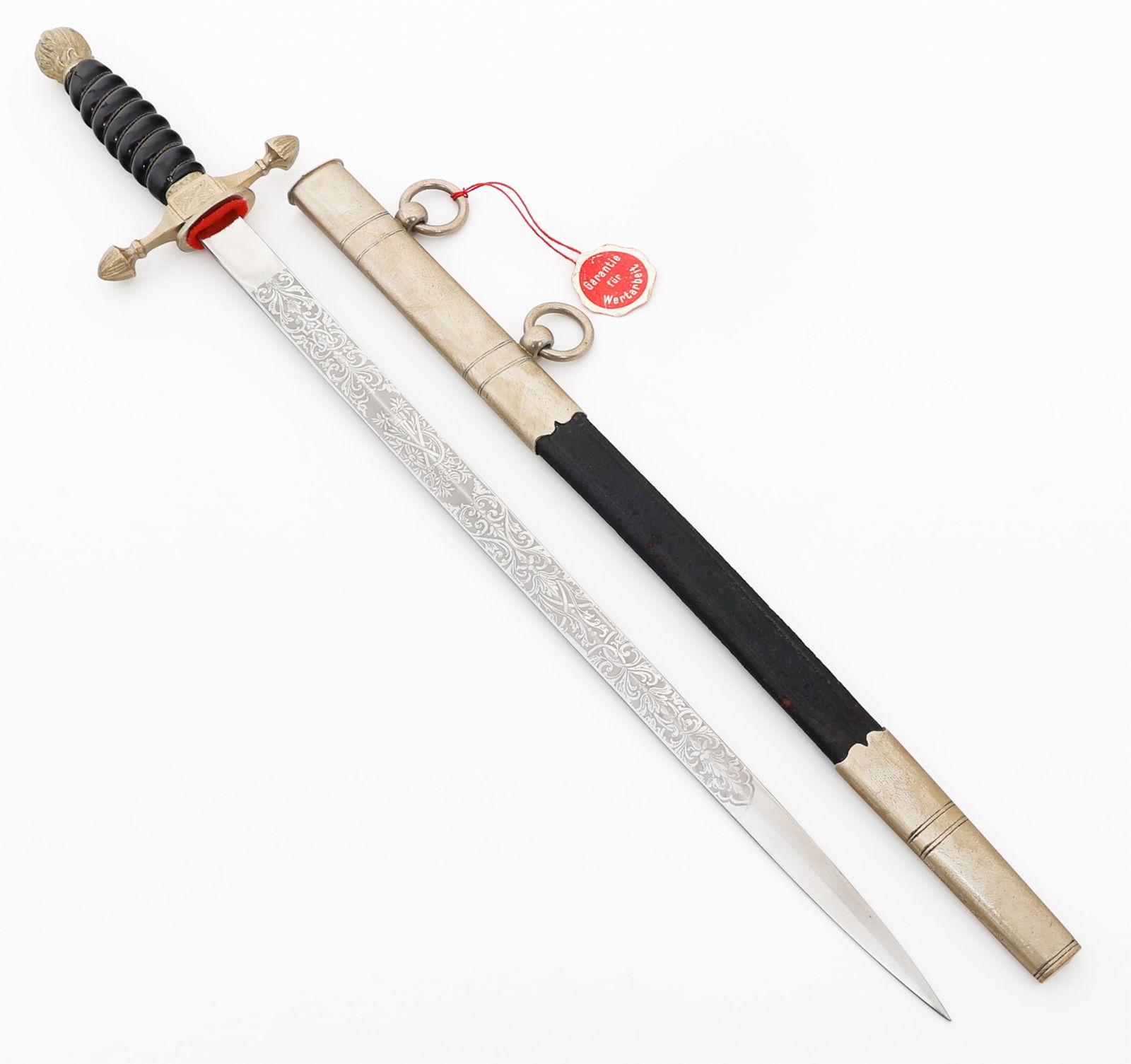 WEIMAR REPUBLIC FIRE OFFICIAL'S DAGGER by WKC: WEIMAR REPUBLIC FIRE OFFICIAL'S DAGGER by WKC German Weimar Republic Fire Official's Dagger by WKC. Double edged, bright blade. Double acid etched with Fireman's ladder and floral patterns. Maker mark