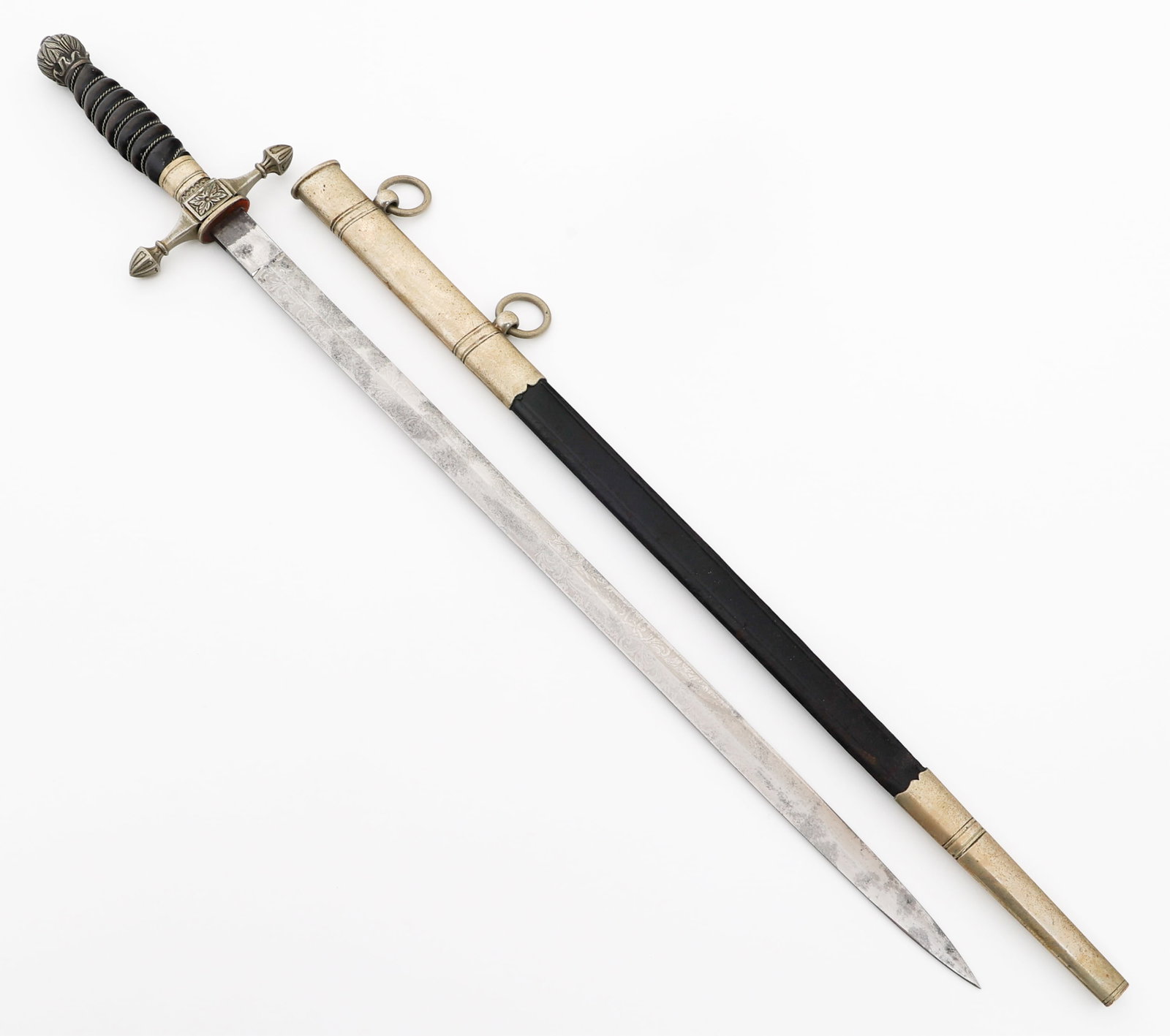 WWI IMPERIAL GERMAN FIRE OFFICIAL'S DRESS DAGGER: WWI IMPERIAL GERMAN FIRE OFFICIAL'S DRESS DAGGER WWI Imperial German Fire Official's Dress Dagger. Double edged, bright blade with acid etched floral designs on both sides. Maker marked by WKC on the 