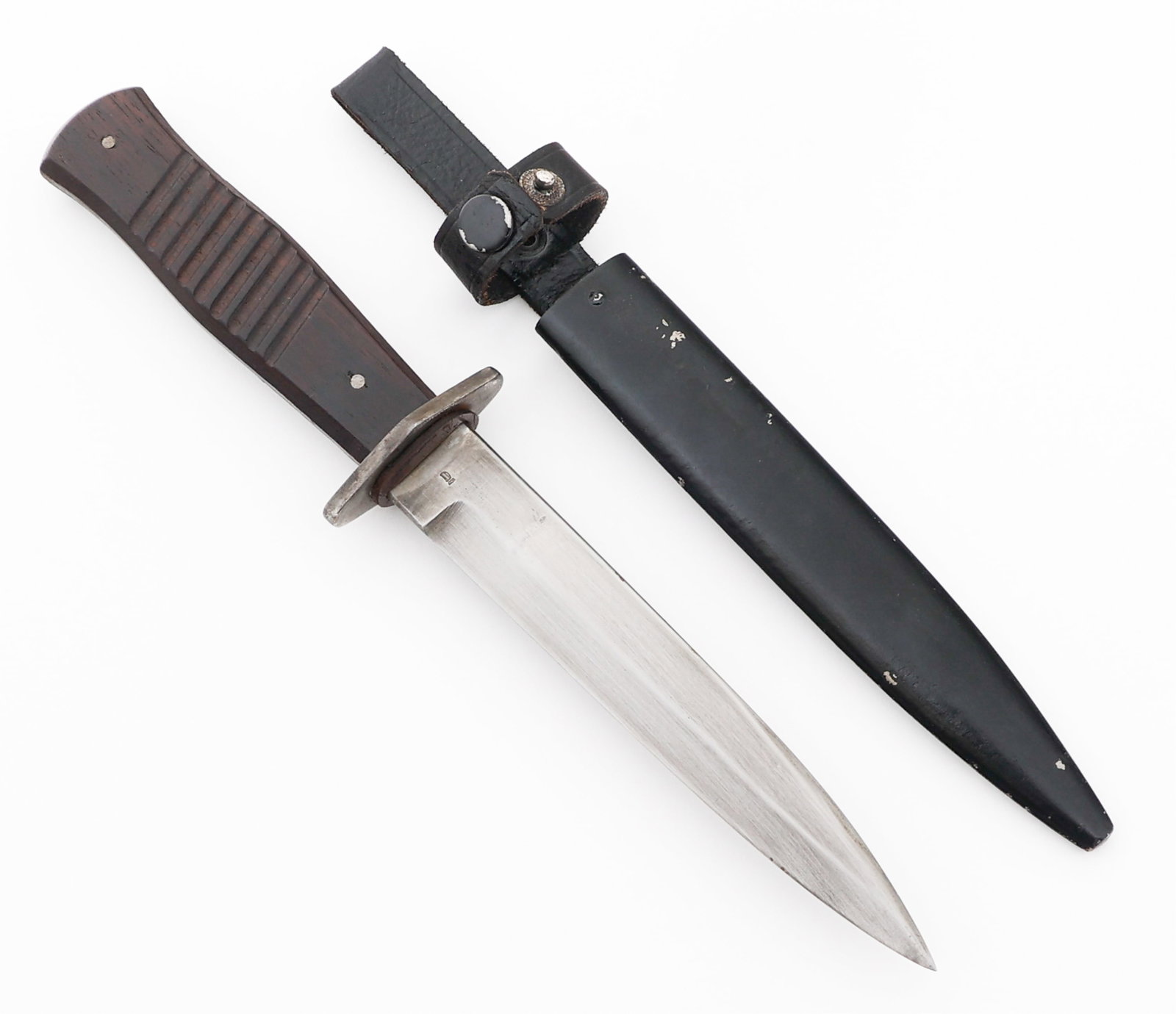 WWI IMPERIAL GERMAN BOOT KNIFE by G. HAMMESFAHR: WWI IMPERIAL GERMAN BOOT KNIFE by G. HAMMESFAHR WWI Imperial German Boot Knife. Single edged, bright, straight blade. Maker mark of Gottlieb Hammesfuhr stamped on one side of the ricasso and royal cyp