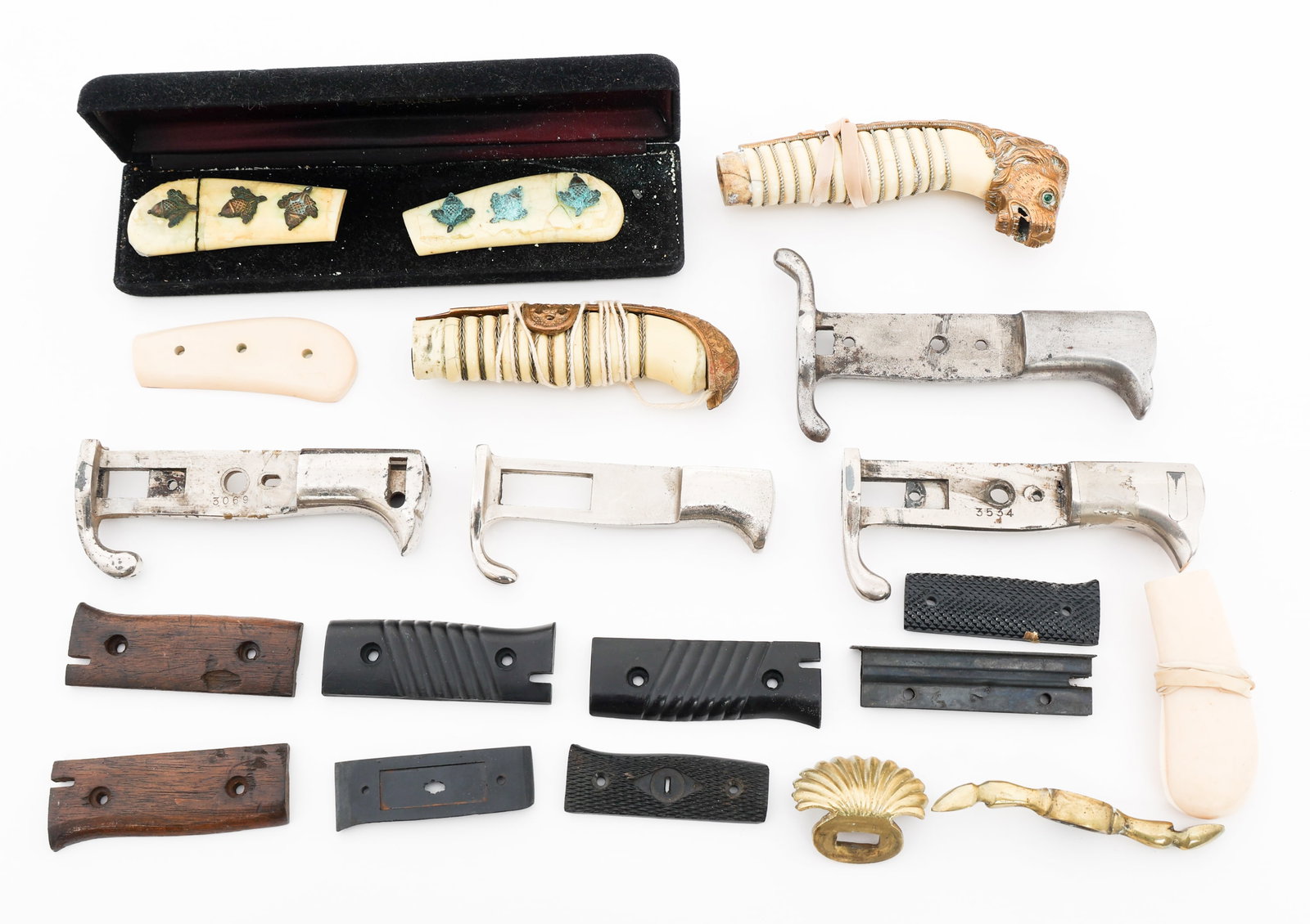 WWI - WWII GERMAN SWORD & DAGGER PARTS: WWI - WWII GERMAN SWORD & DAGGER PARTS WWI - WWII German Sword and Dagger Parts. Includes hilts, grips and guards. Provenance: Lifetime Edged Weapon & Military Memorabilia Collection of Gregory P. Voe