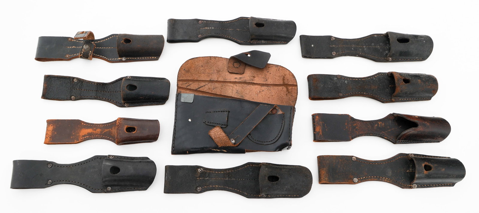 WWII GERMAN K98 LEATHER FROGS & AXE SHEATH: WWII GERMAN K98 LEATHER FROGS & AXE SHEATH WWII German K98 Leather Frogs and Axe Scabbard. (10) K98 Frogs. (1) Axe Head Sheath. Provenance: Lifetime Edged Weapon & Military Memorabilia Collection of G