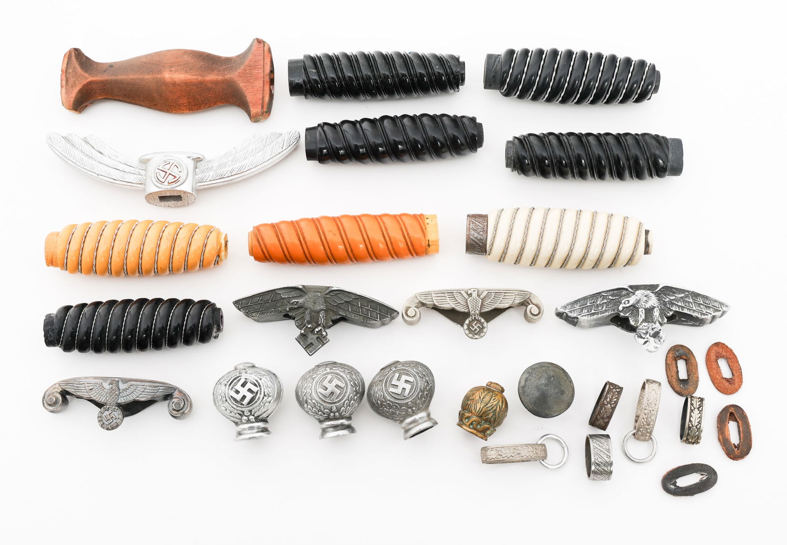 WWII GERMAN LUFTWAFFE, HEER & SA DAGGER PARTS: WWII GERMAN LUFTWAFFE, HEER & SA DAGGER PARTS WWII German Luftwaffe, Heer and SA Dagger Parts. Includes guards, handles, leather buffer pads, ferrules and pommels. Provenance: Lifetime Edged Weapon &
