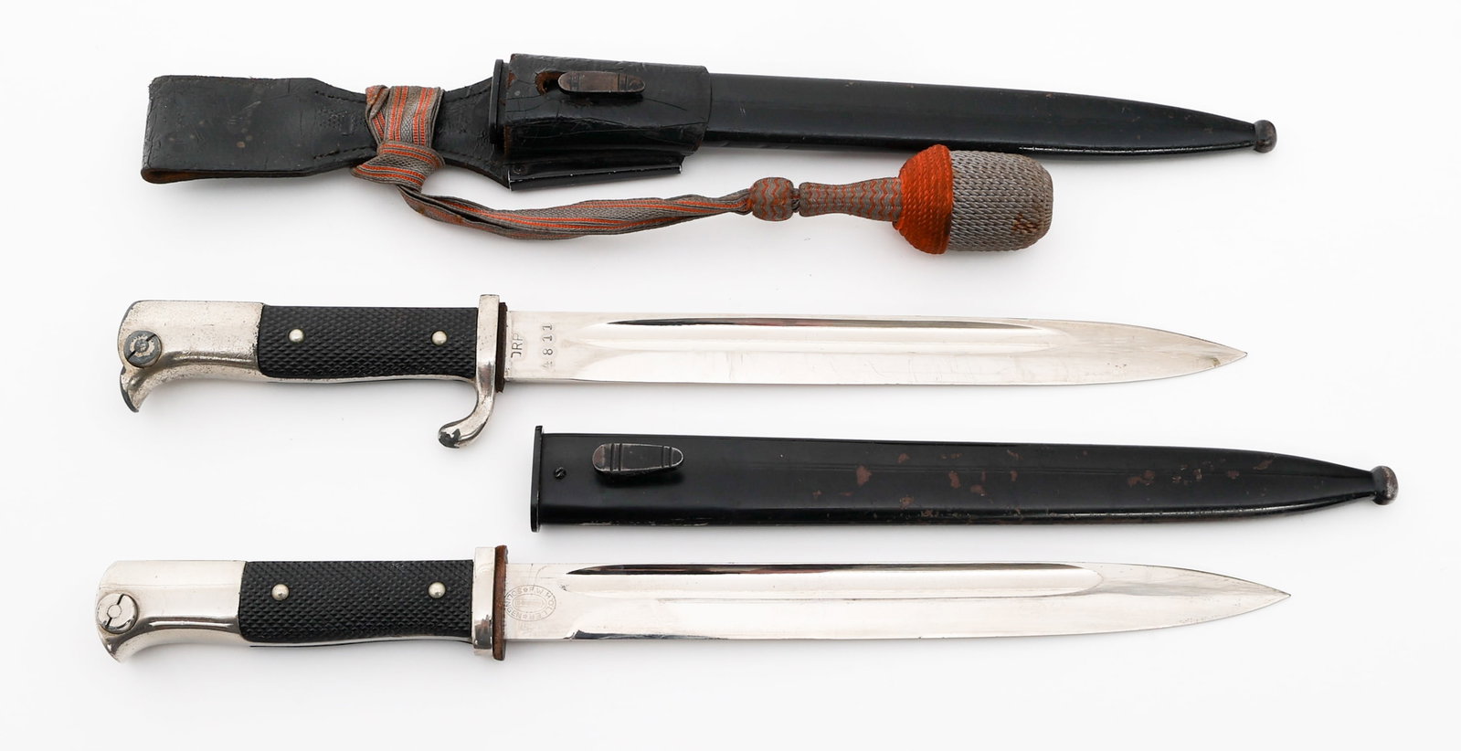 WWII GERMAN DRP POSTSCHUTZ & K98 DRESS BAYONETS: WWII GERMAN DRP POSTSCHUTZ & K98 DRESS BAYONETS WWII German DRP Postschutz & Standard K98 Dress Bayonets. (1) DRP Postschutz K98 Dress Bayonet. Single edged, bright blade with fuller. Maker marked by 
