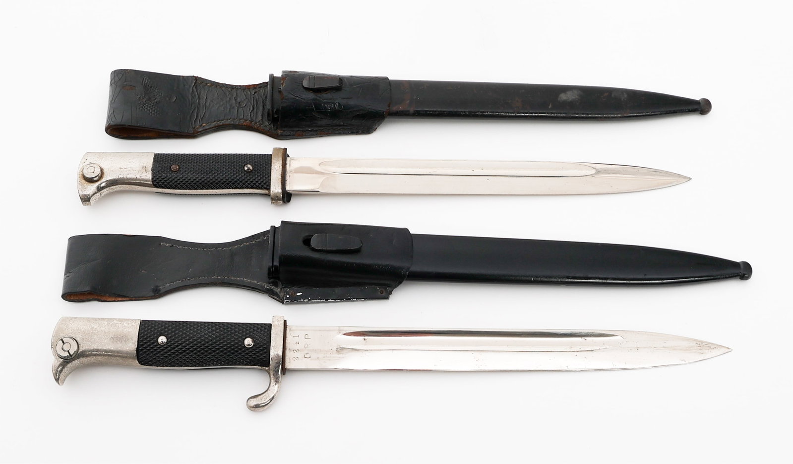 WWII GERMAN DRP POSTSCHUTZ & K98 DRESS BAYONETS: WWII GERMAN DRP POSTSCHUTZ & K98 DRESS BAYONETS WWII German DRP Postschutz & Standard K98 Dress Bayonets. (1) DRP Postschutz K98 Dress Bayonet. Single edged, bright blade with fuller. Maker marked by 