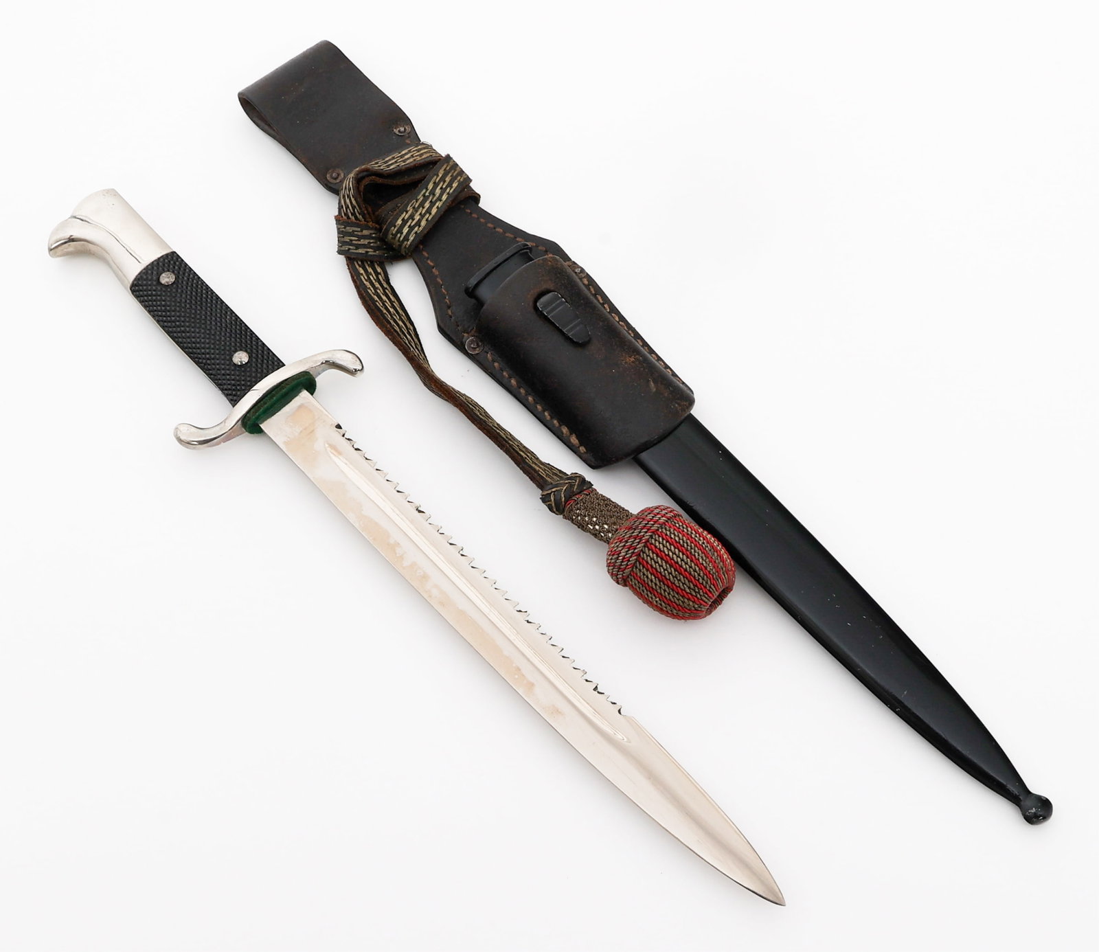 WWII GERMAN FIREMAN K98 SAWBACK BAYONET: WWII GERMAN FIREMAN K98 SAWBACK BAYONET WWII German Fireman K98 Sawback Bayonet. Single edged, bright blade with fuller and sawback spine. No visible maker marks or stamps. Felt buffer pad present. Ni