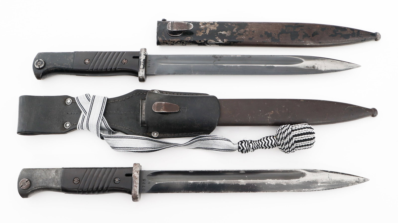 WWII GERMAN K98 COMBAT BAYONETS WITH SCABBARDS: WWII GERMAN K98 COMBAT BAYONETS WITH SCABBARDS WWII German K98 Combat Bayonets. (1) Combat K98. Single edged blade with fuller. Maker mark of Clemen & Jung stamped on the ricasso, " 8964h" on the reve